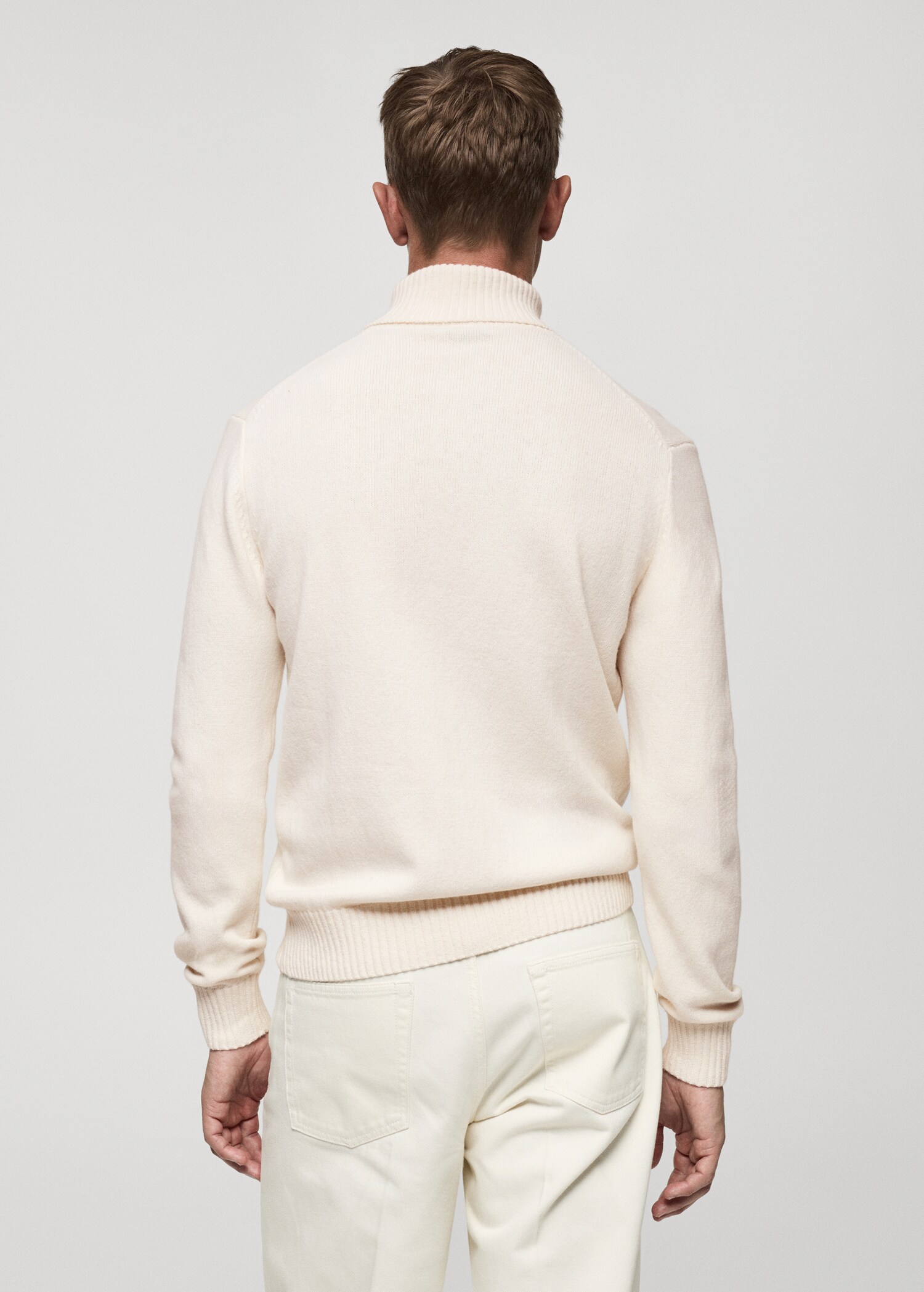 Knitted wool turtleneck sweater - Reverse of the article
