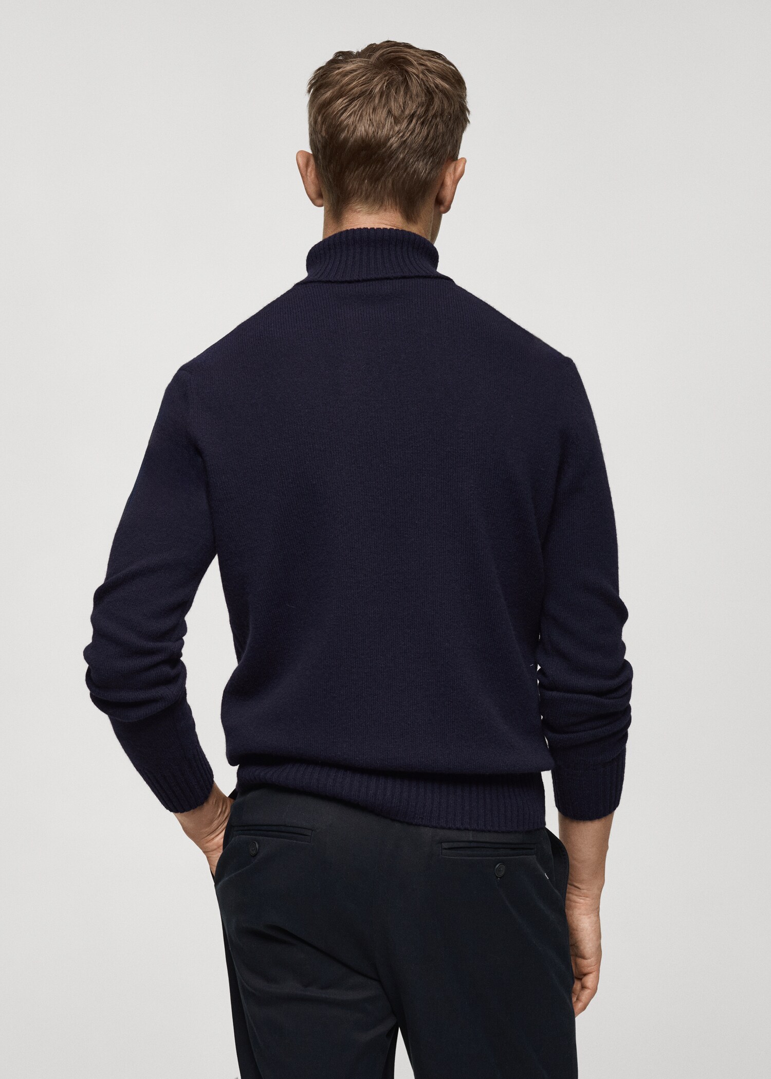 Knitted wool turtleneck sweater - Reverse of the article