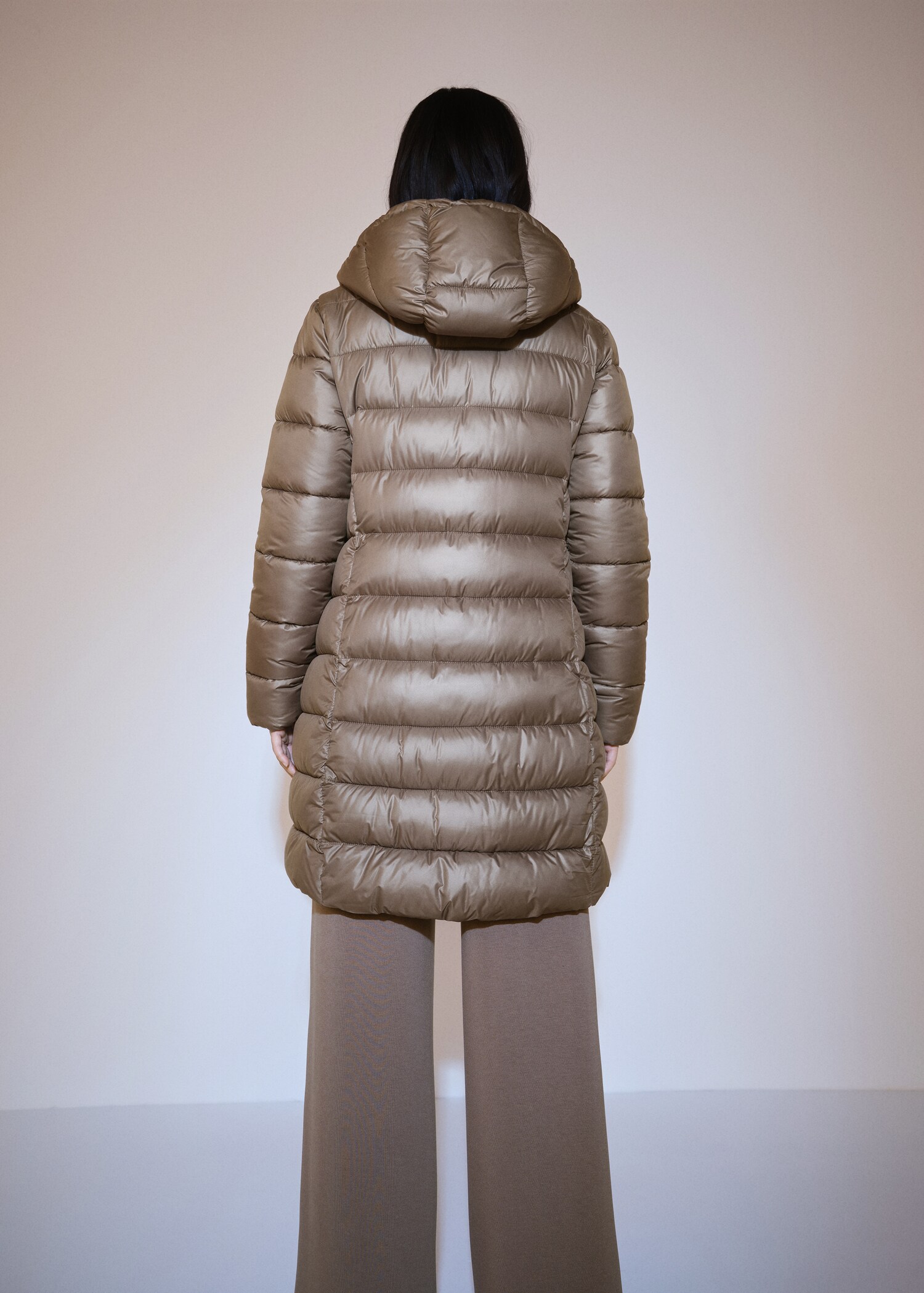 Water-repellent quilted coat - Reverse of the article
