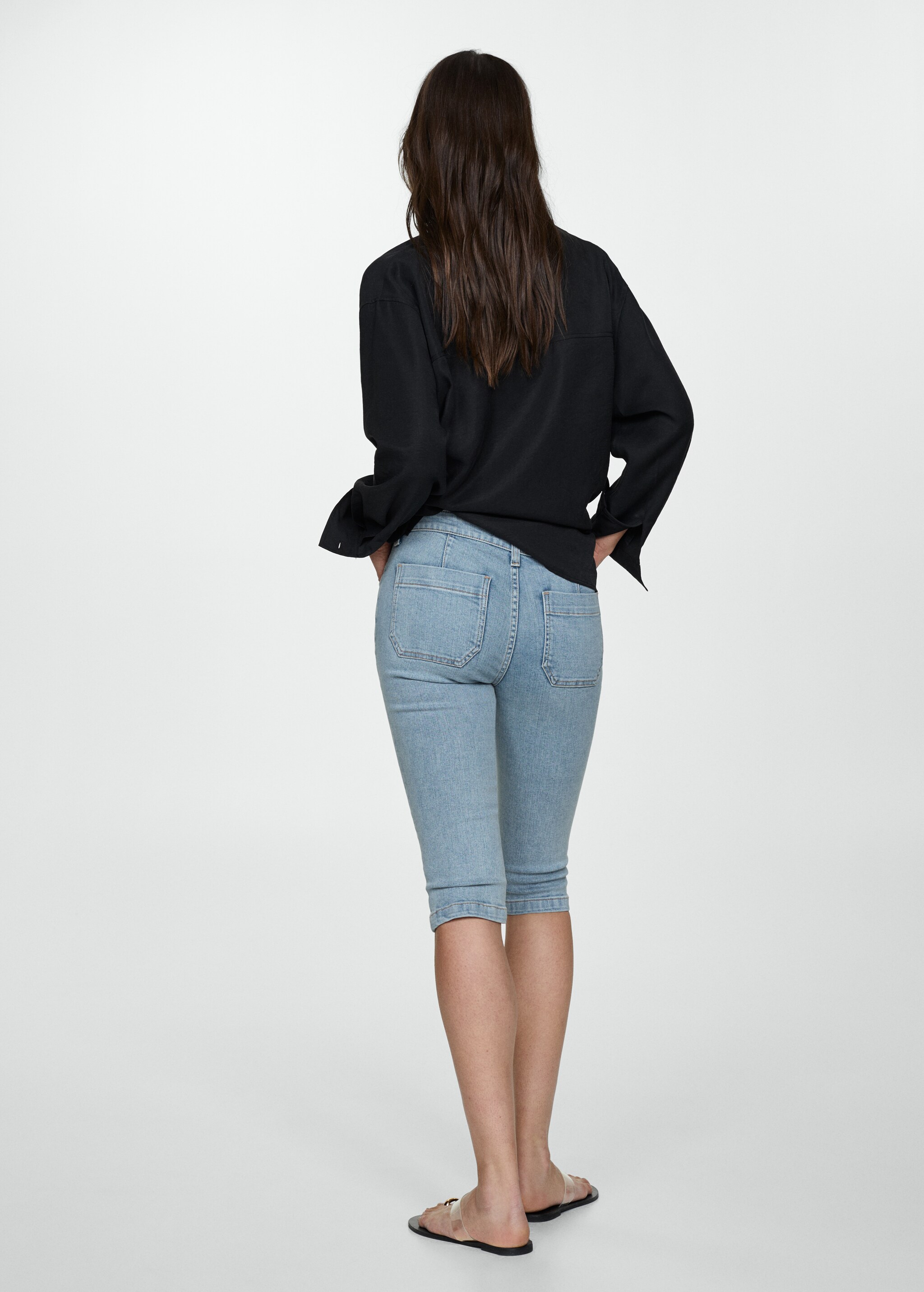 Slim capri jeans with decorative stitching - Reverse of the article