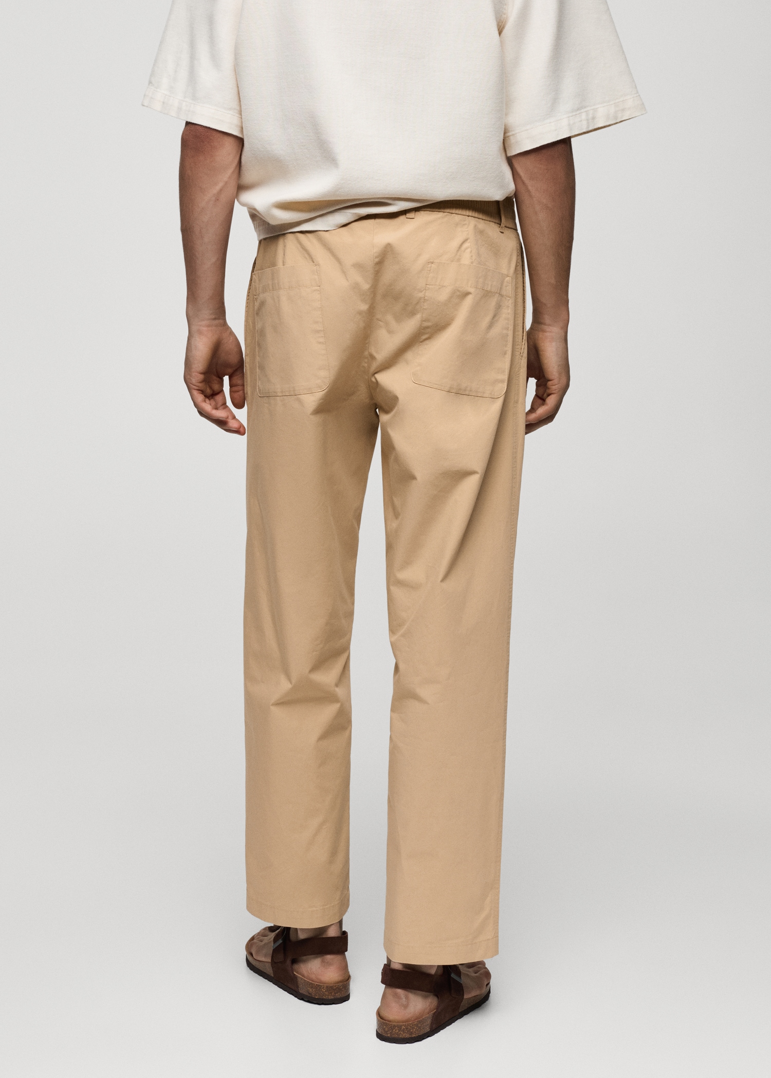 Drawstring cotton trousers - Reverse of the article