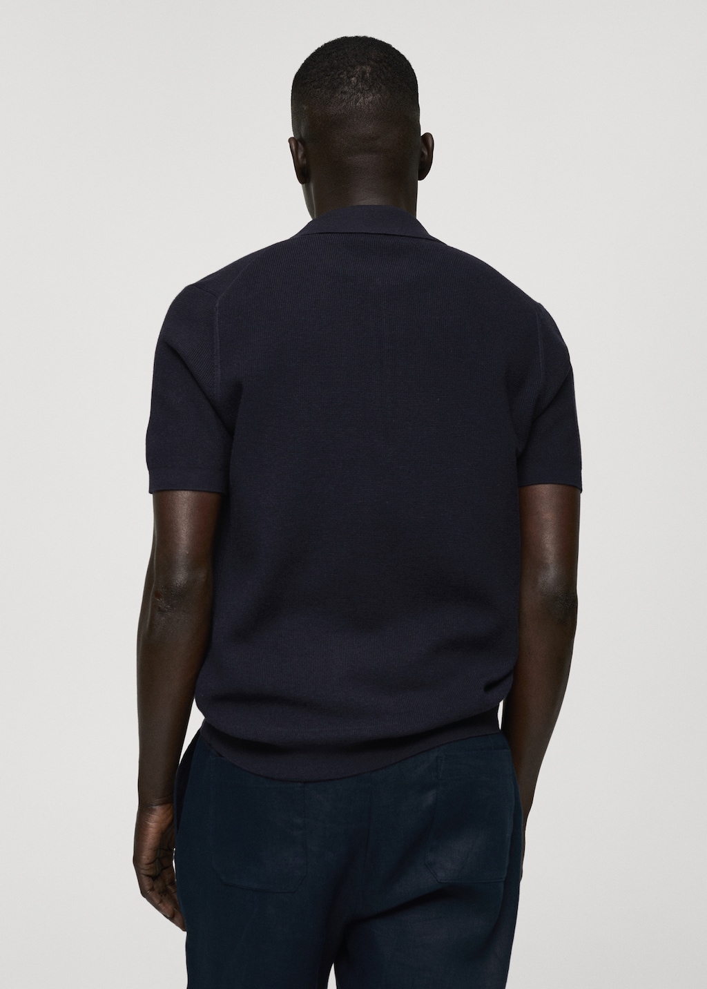 Knitted polo shirt with zip Men MANGO Bahrain