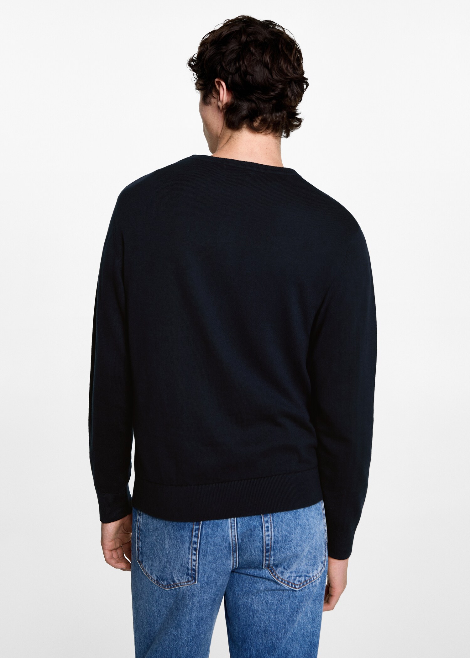Round-neck knitted sweater - Reverse of the article