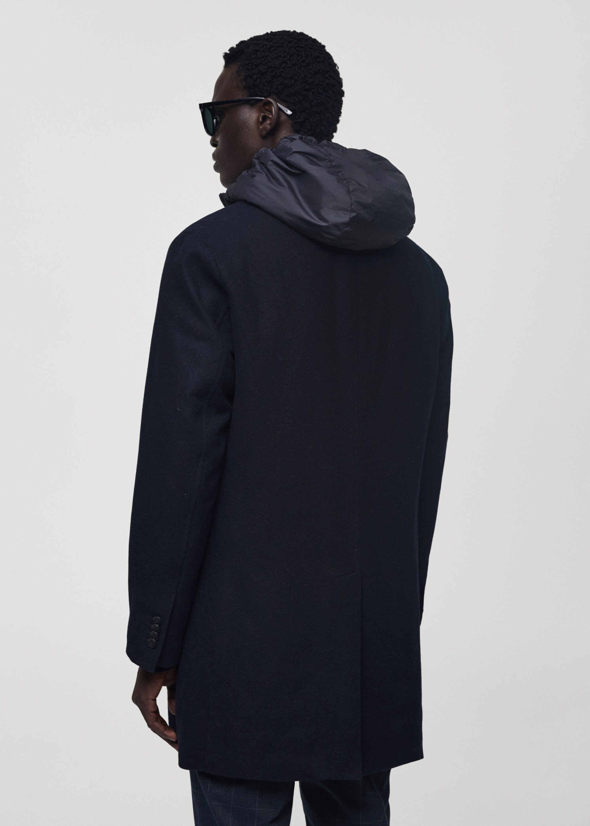 Wool coat with quilted interior hood - Reverse of the article