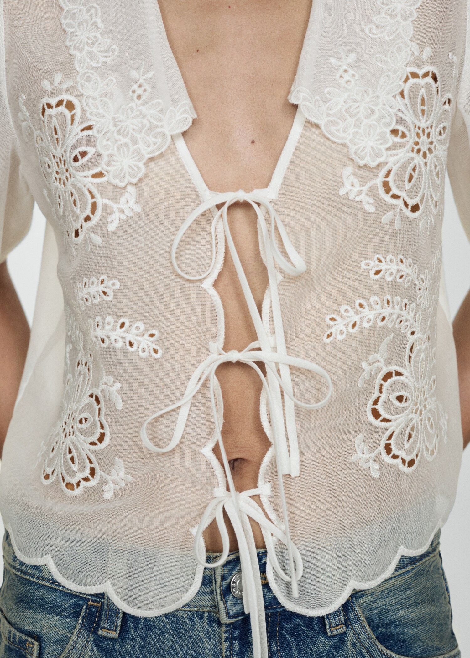 Embroidered blouse with bows - Details of the article 6