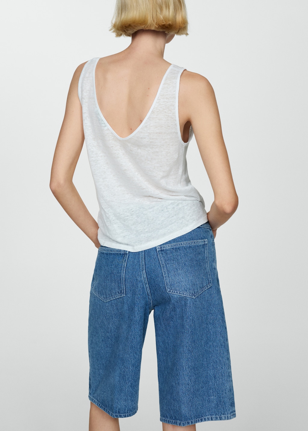 Linen top with knotted straps