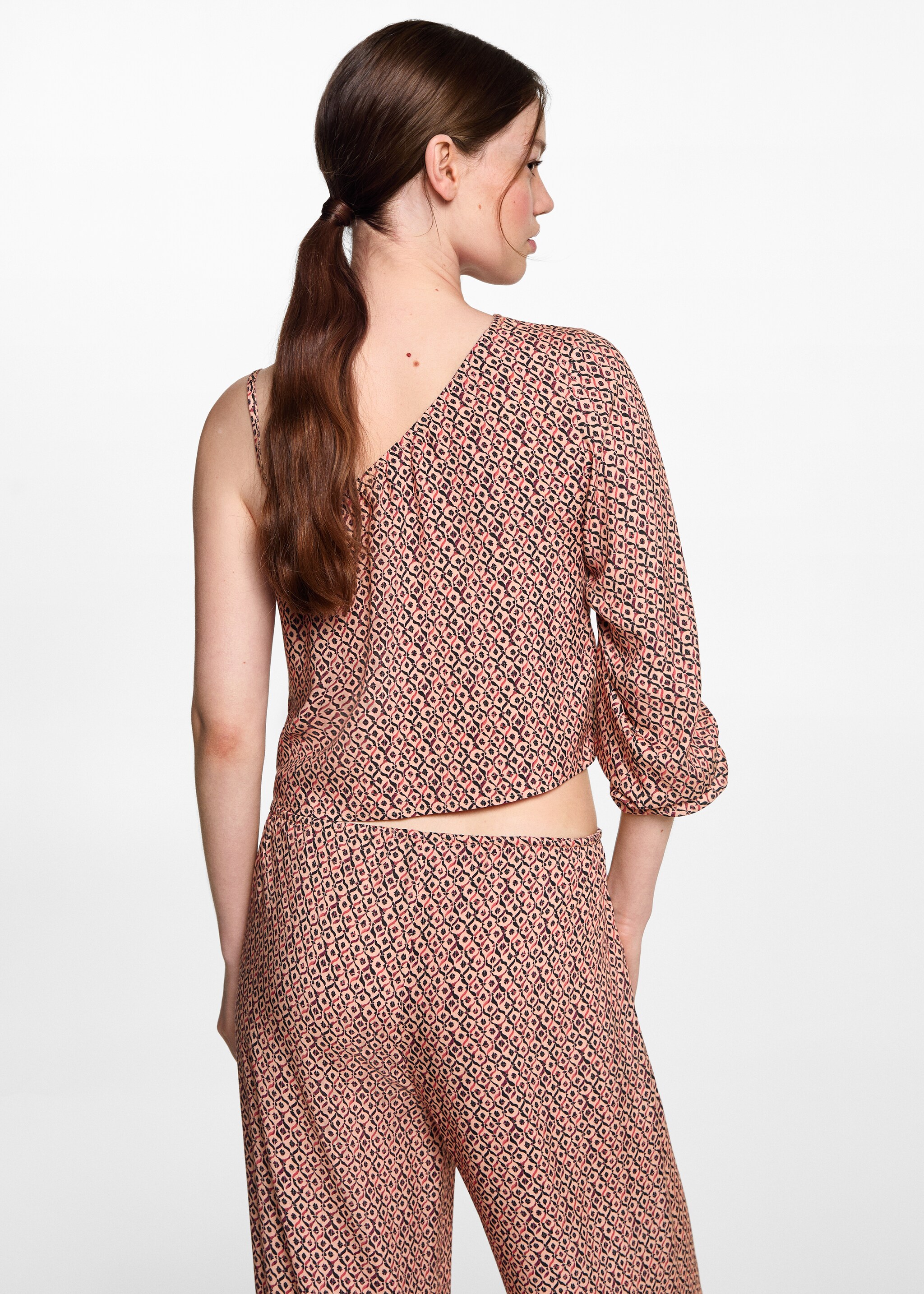 Asymmetrische Bluse mit Motiv - Rückseite des Artikels