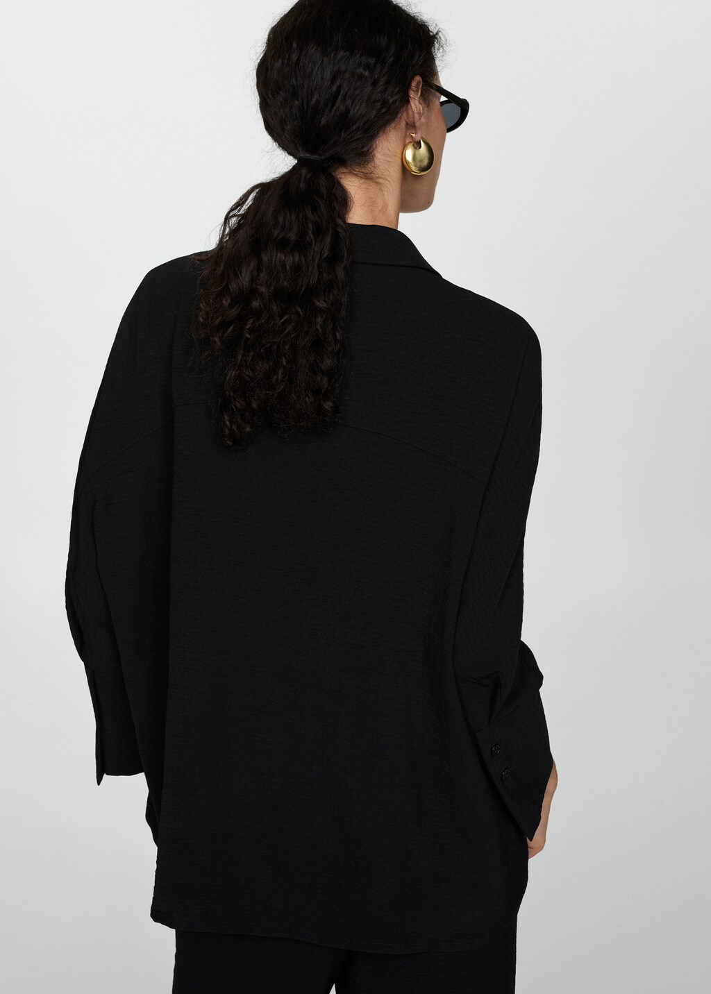 Textured flowy blouse Women MANGO USA