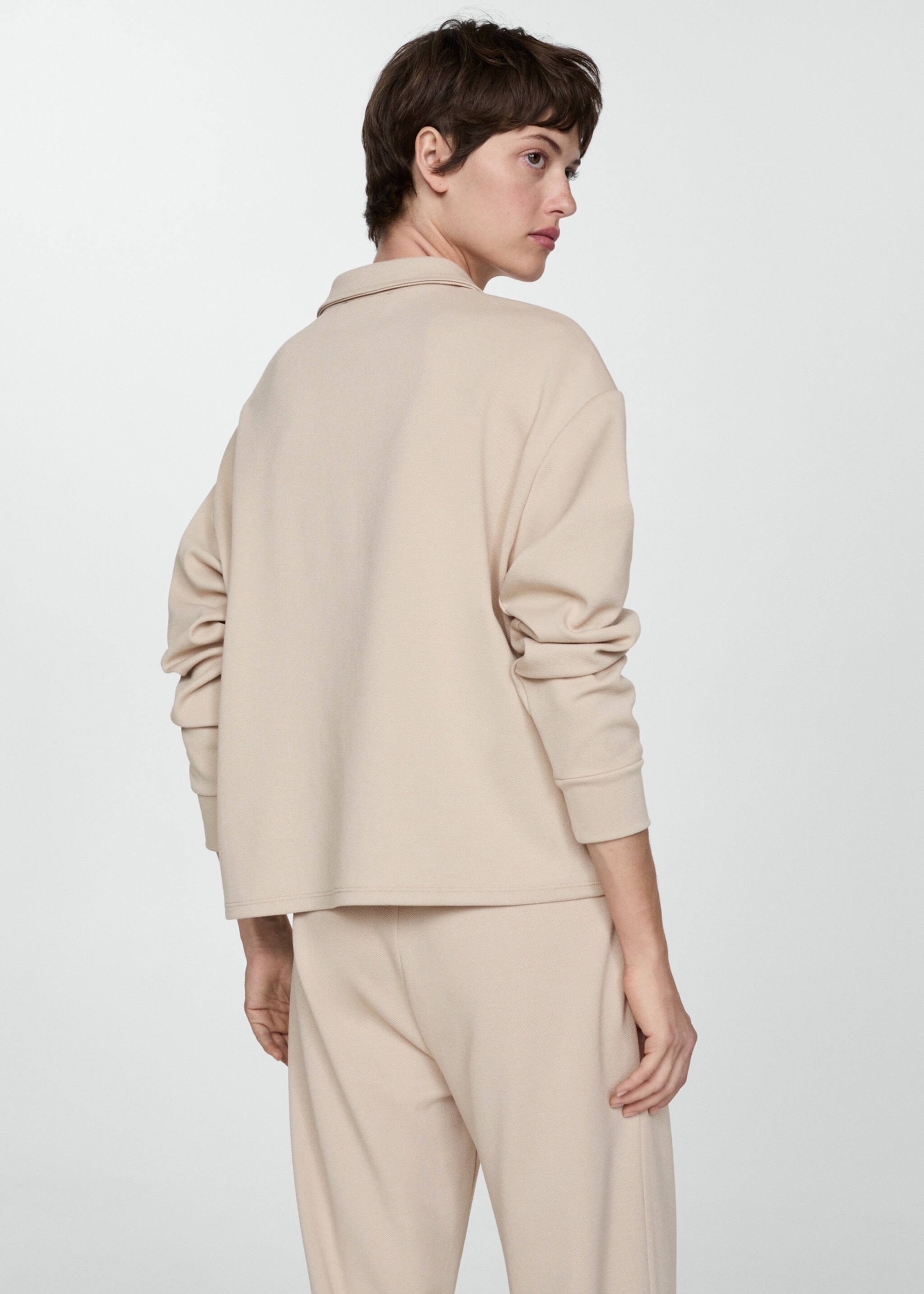 Sudadera cuello polo - Reverso del artículo