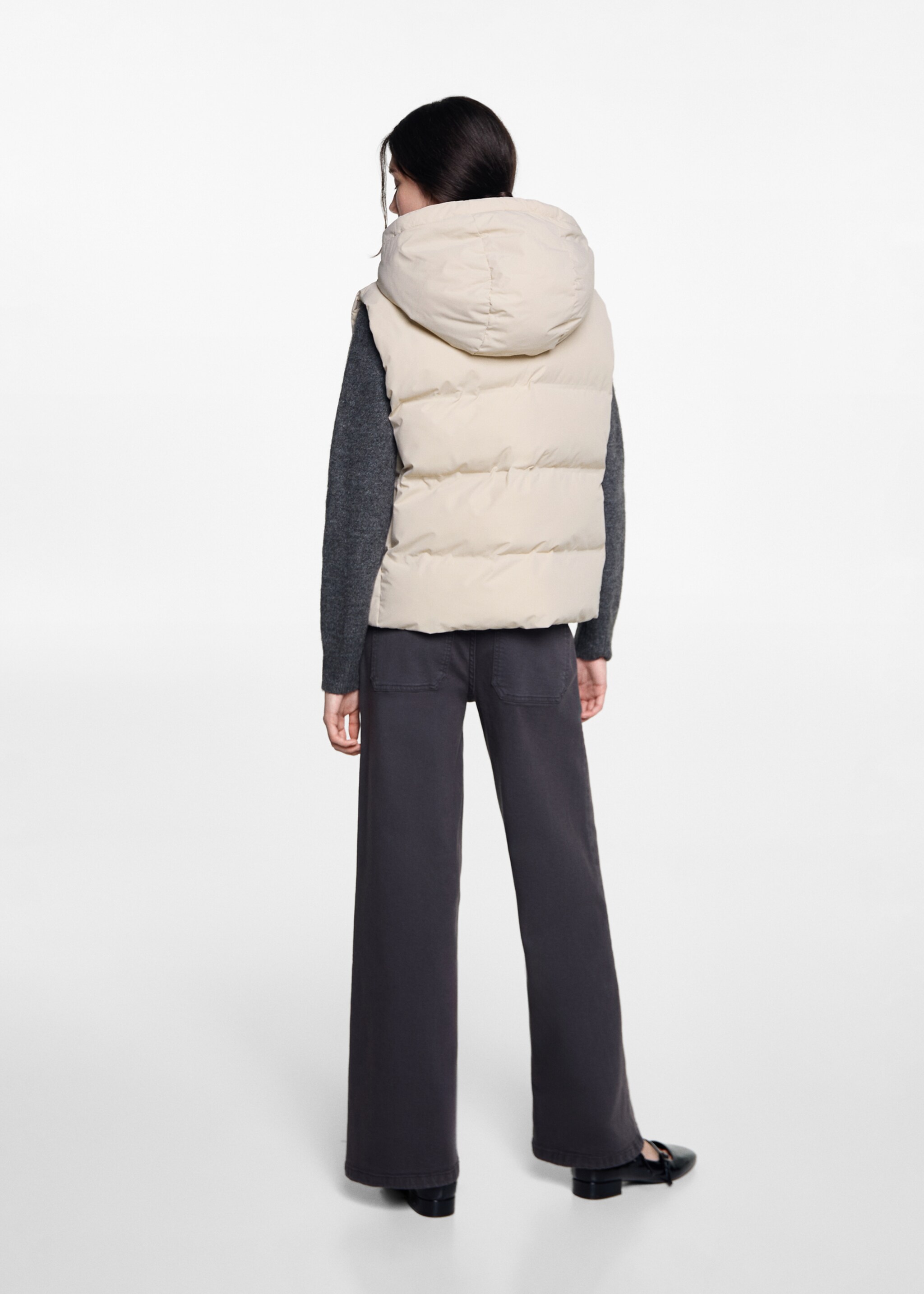Quilted gilet with hood - Reverse of the article