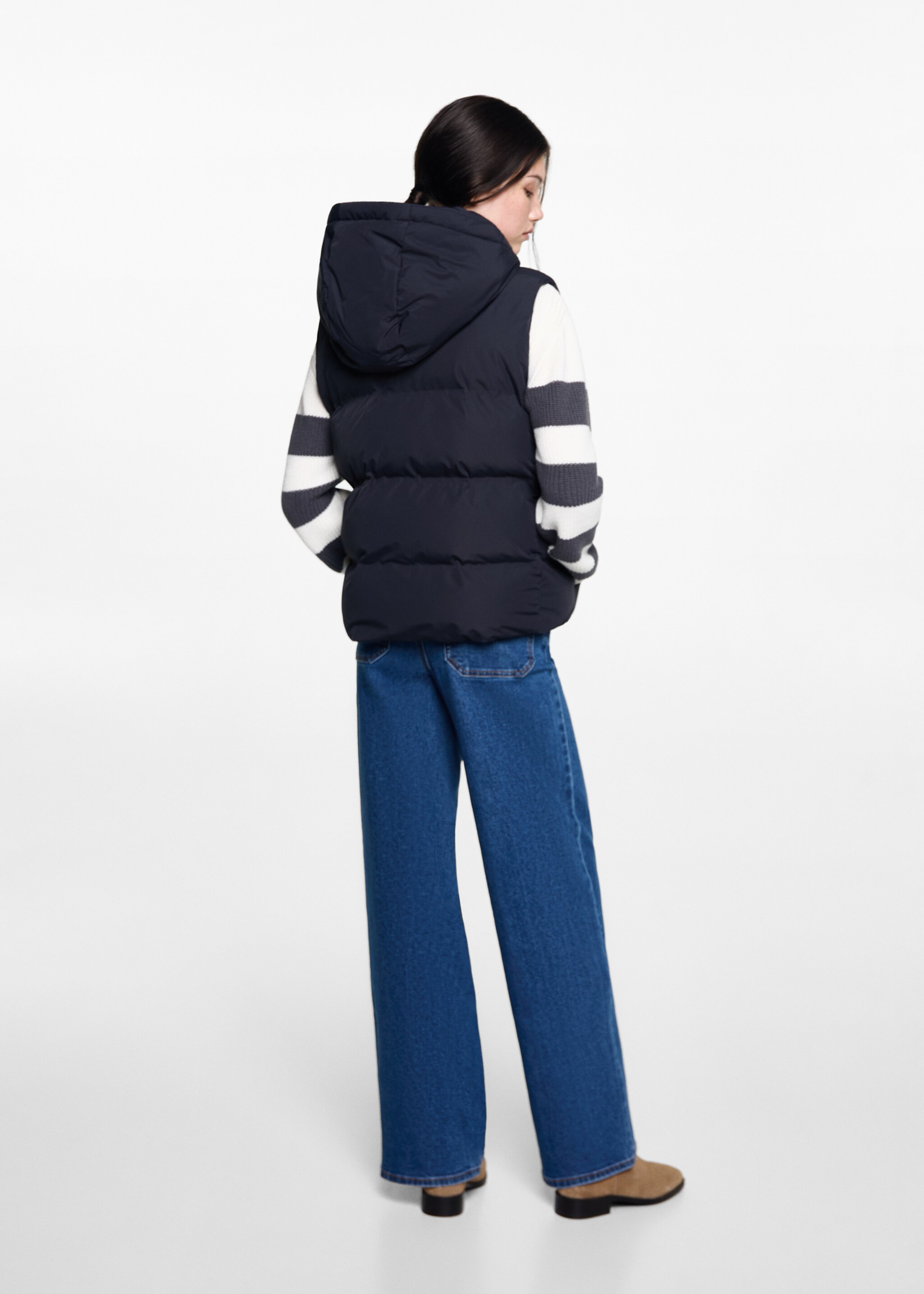 Quilted gilet with hood - Reverse of the article
