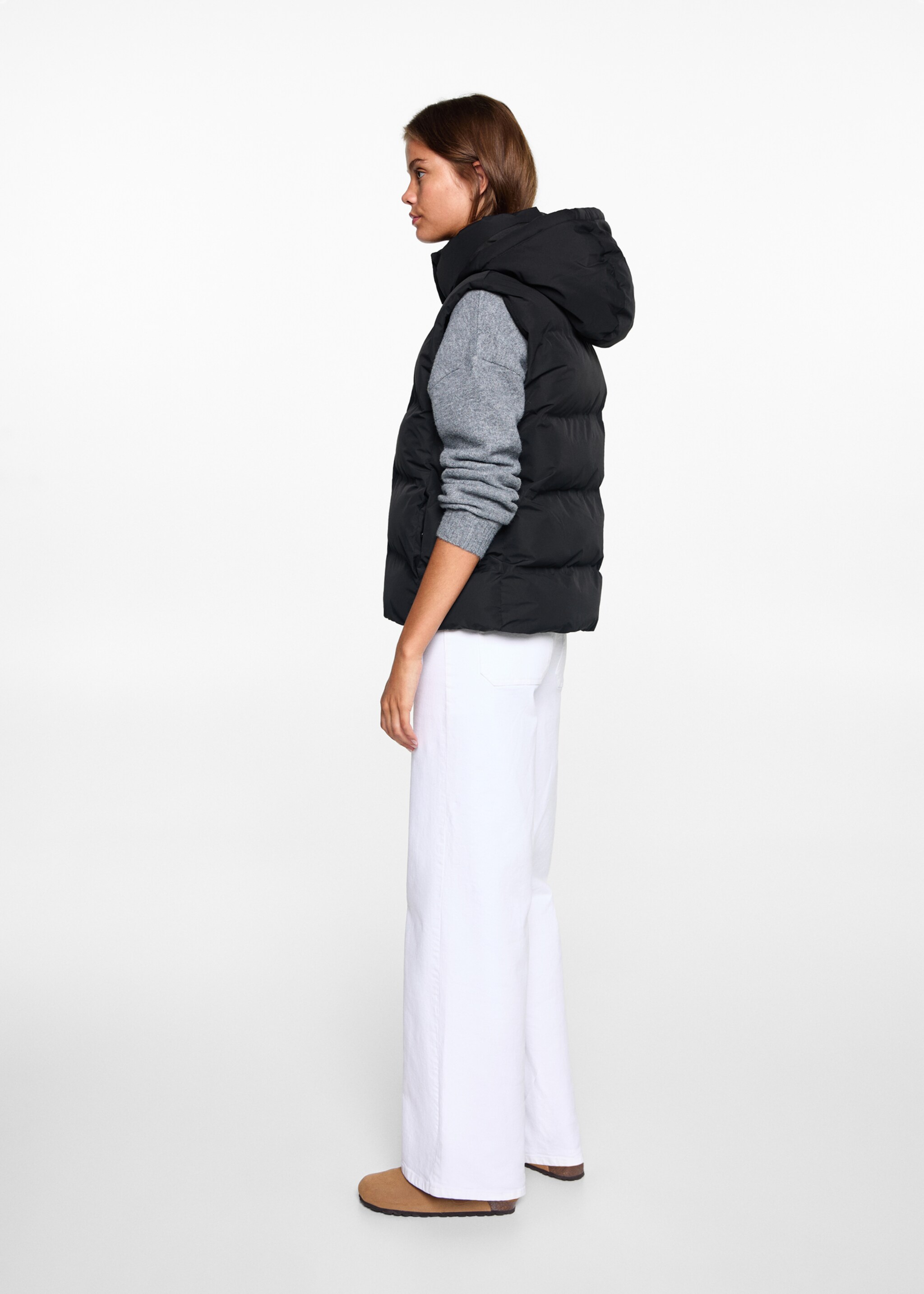 Quilted gilet with hood - Reverse of the article