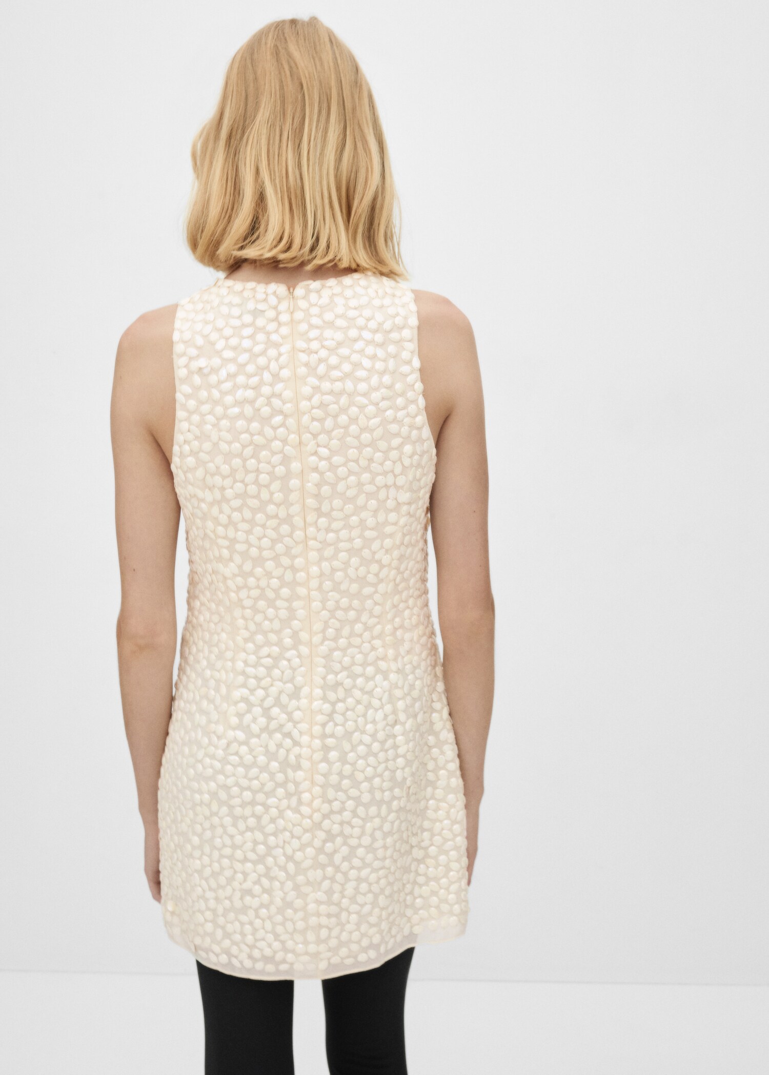 Robe courte perles - Verso de l’article