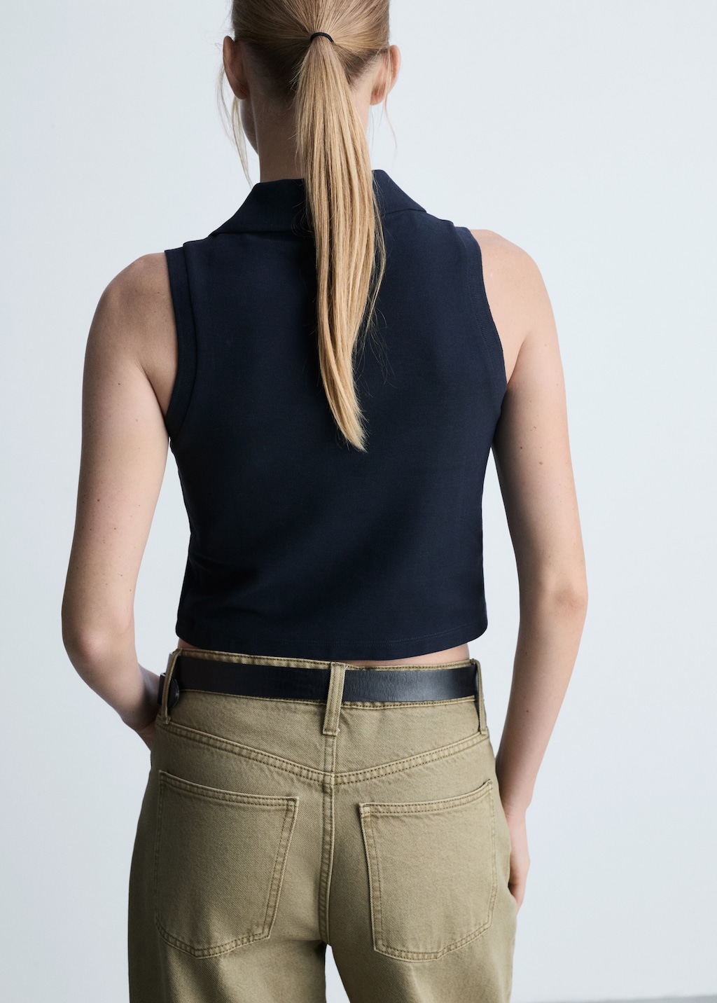 Black cropped polo shirt sale