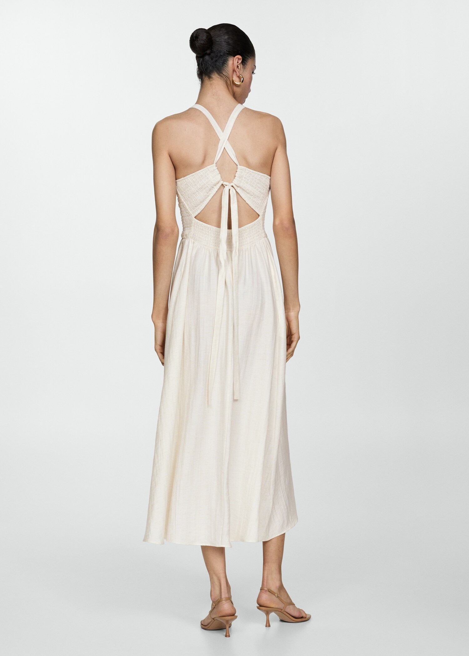 Flared dress with ruffled hem - Reverse of the article