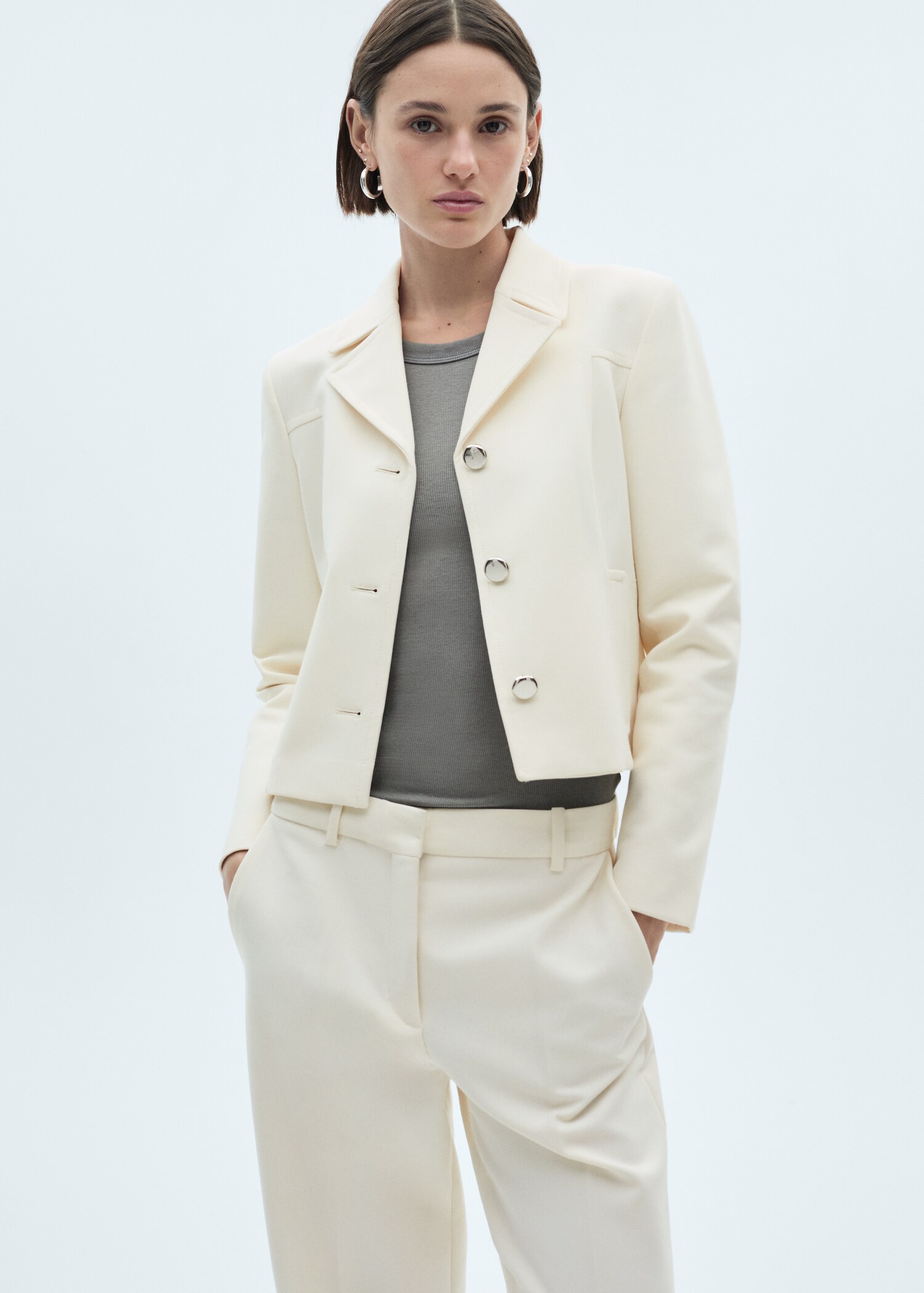Jacket with lapels and metal buttons - Средний план