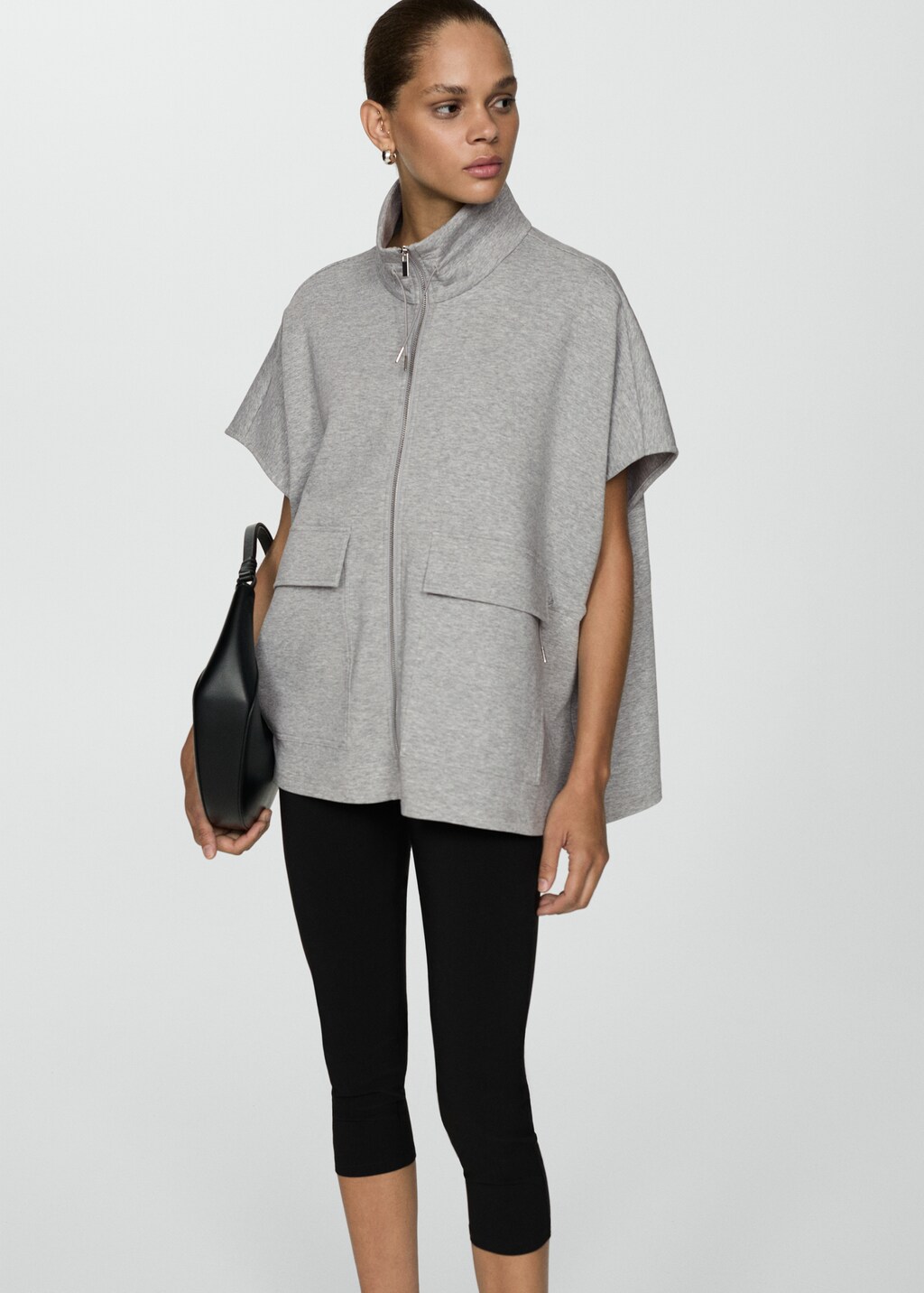 Poncho jacket with flap pockets Women MANGO Philippines