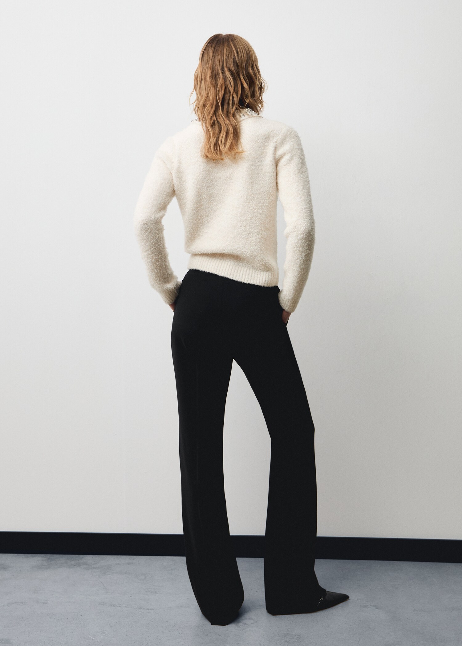 Polo-neck sweater with rhinestones - Reverse of the article