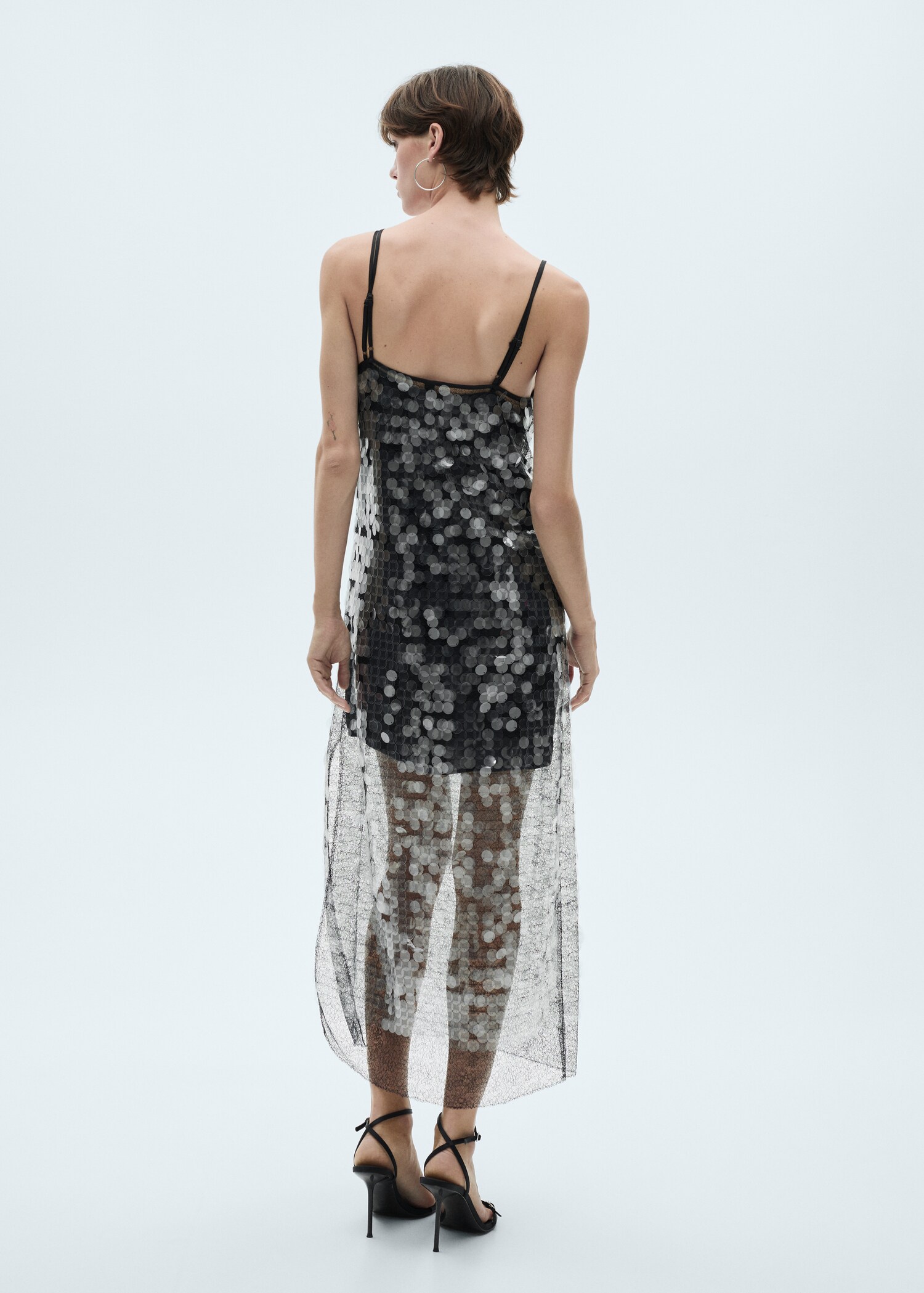 Semi-transparent disc dress - Reverse of the article