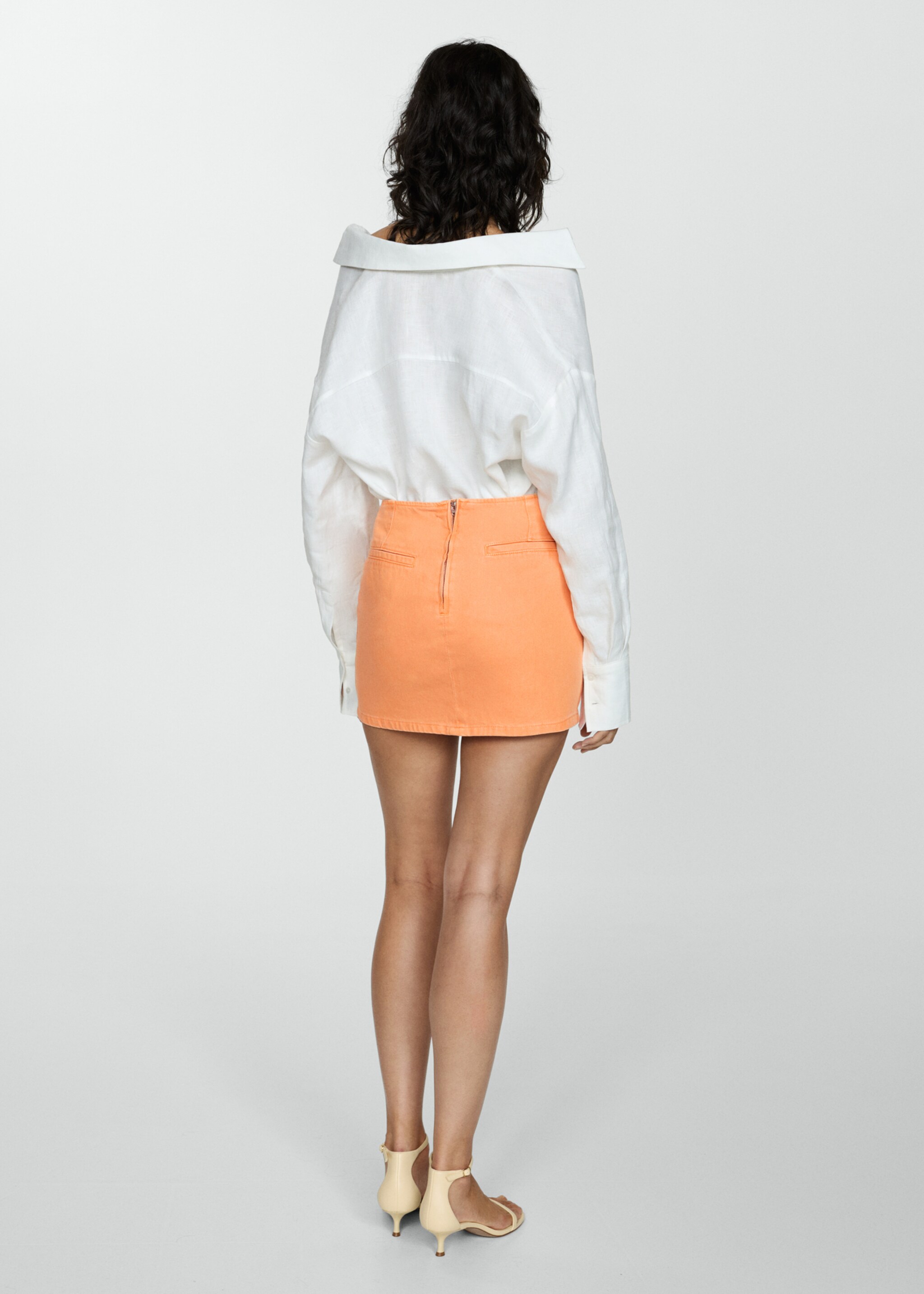 Crossed denim mini-skirt - Reverse of the article, Orange. Ref: 77050377-00.