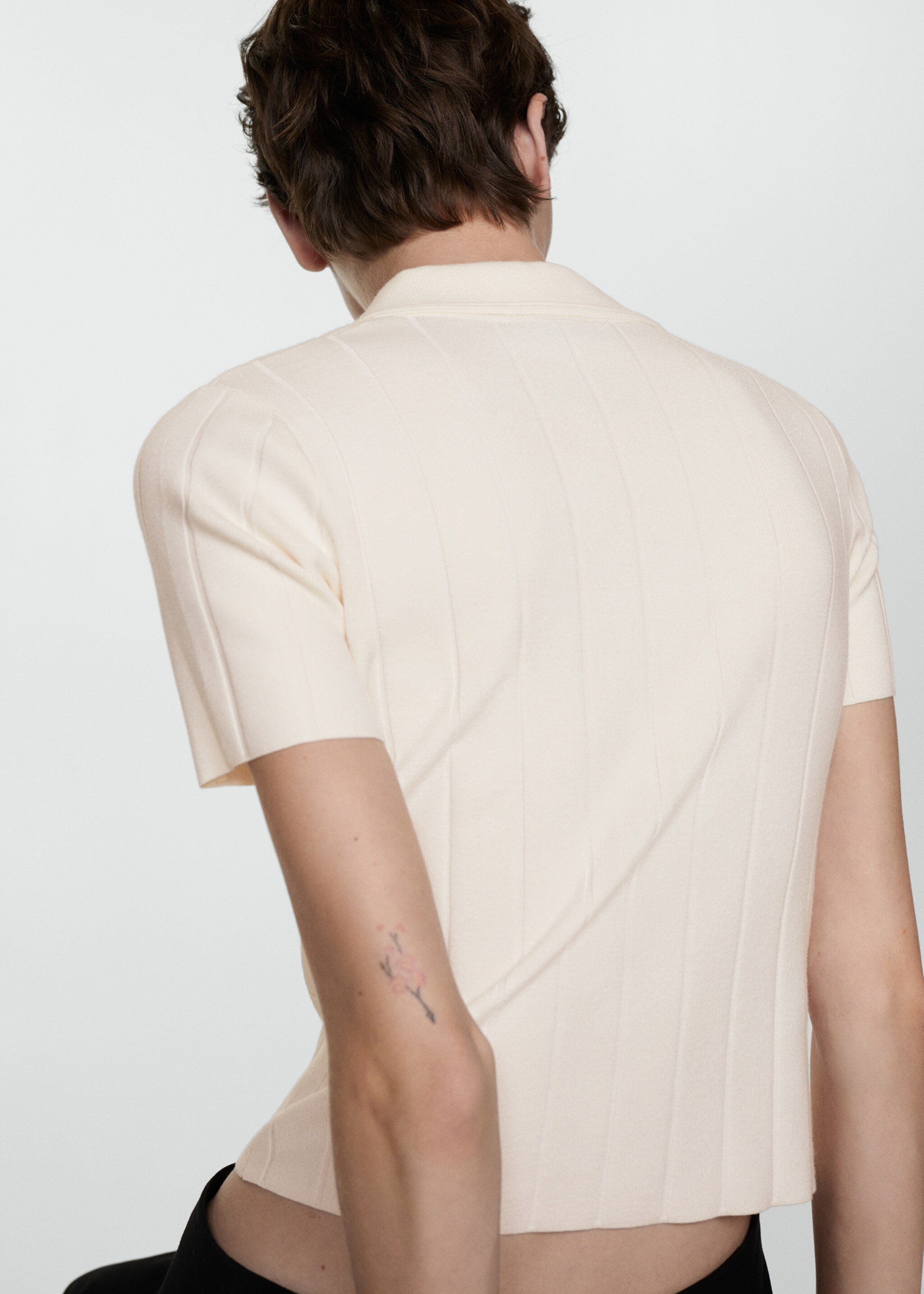 Camiseta cuello polo - Reverso del artículo
