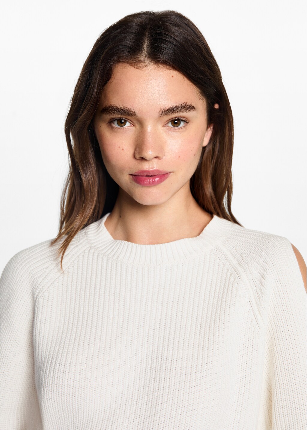 Knitted sweater with openings