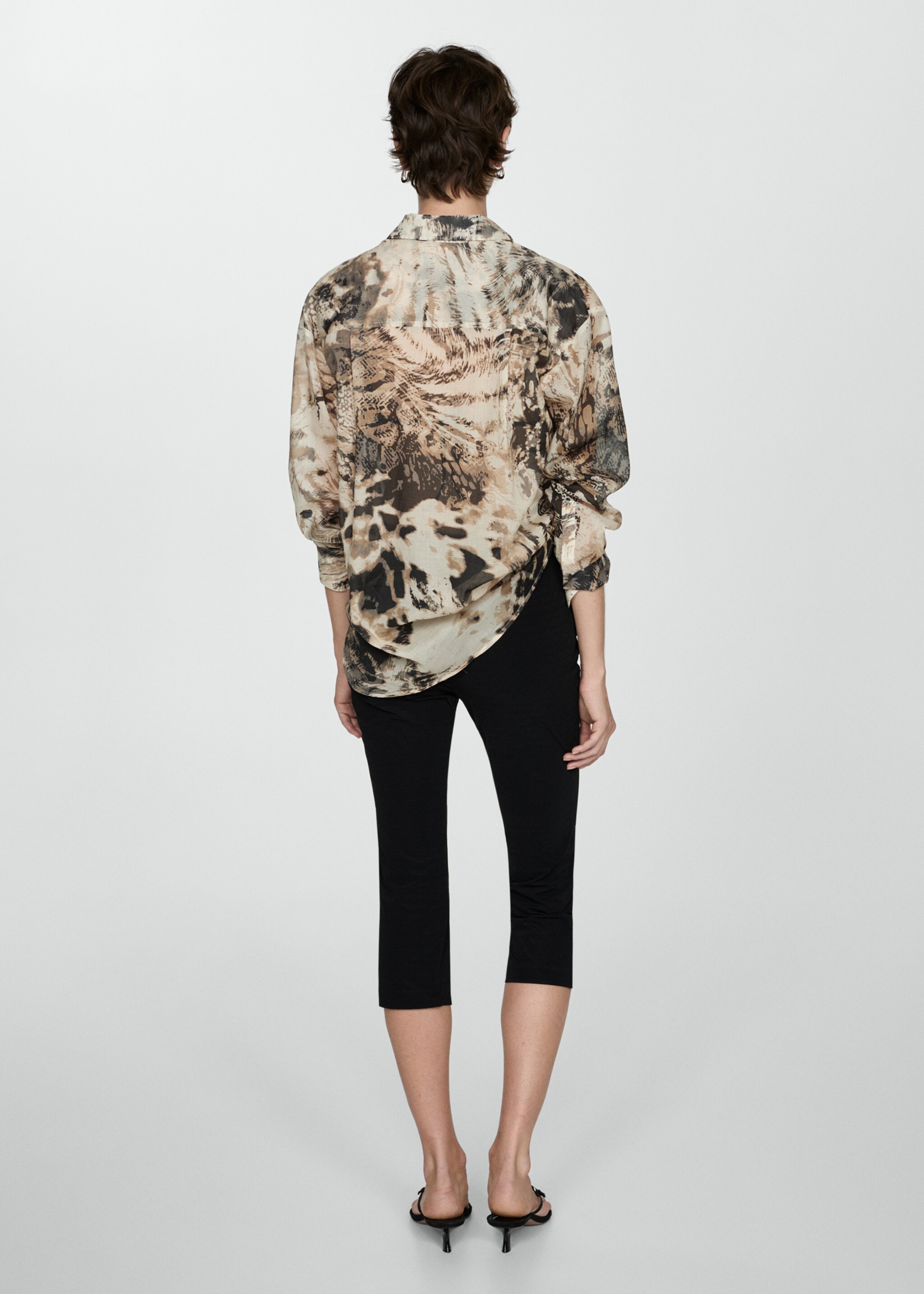 Semi-transparent animal-print shirt - Reverse of the article