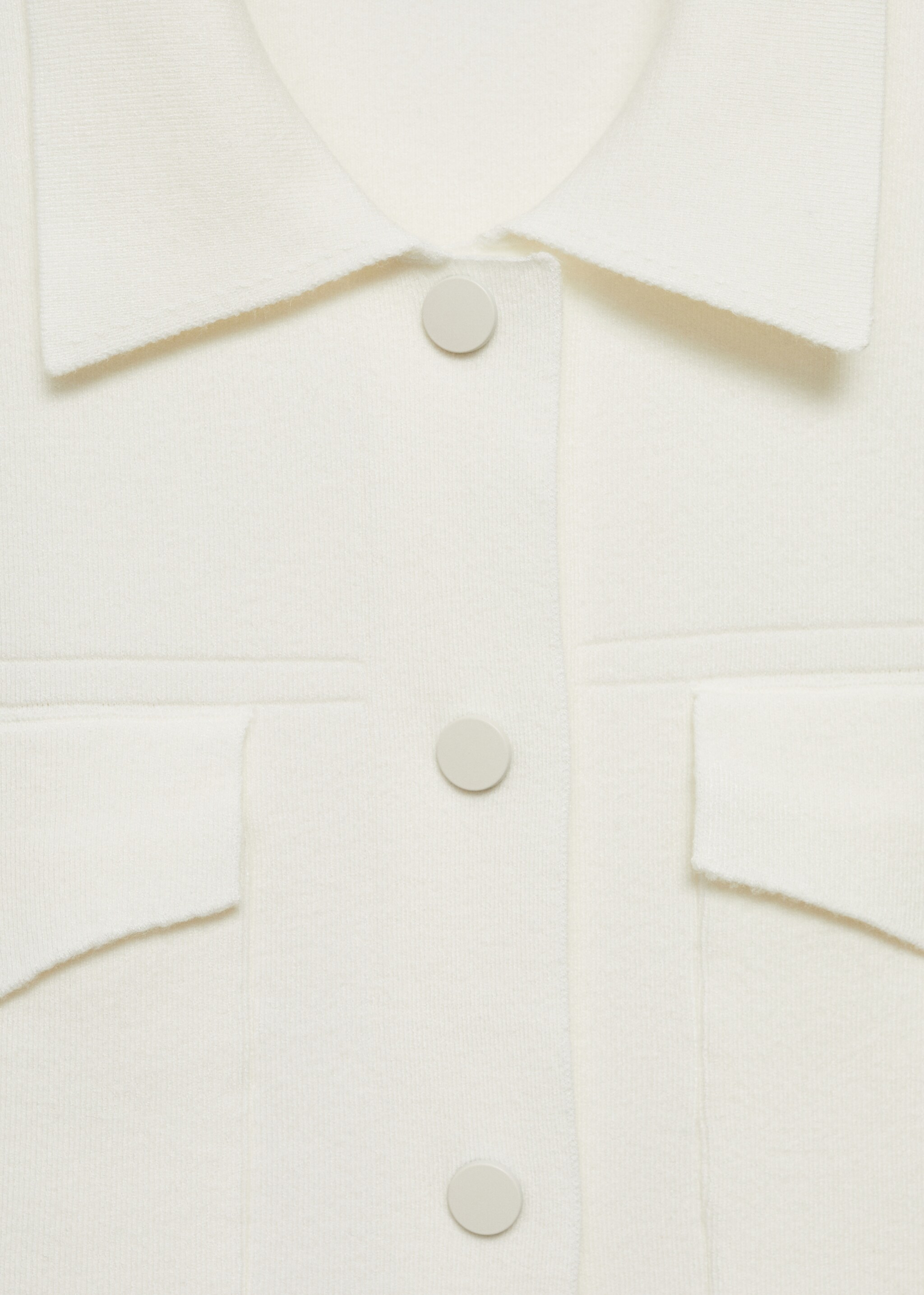 Knitted vest with pockets - Details of the article 0, Ecru. Ref: 77054022-00.