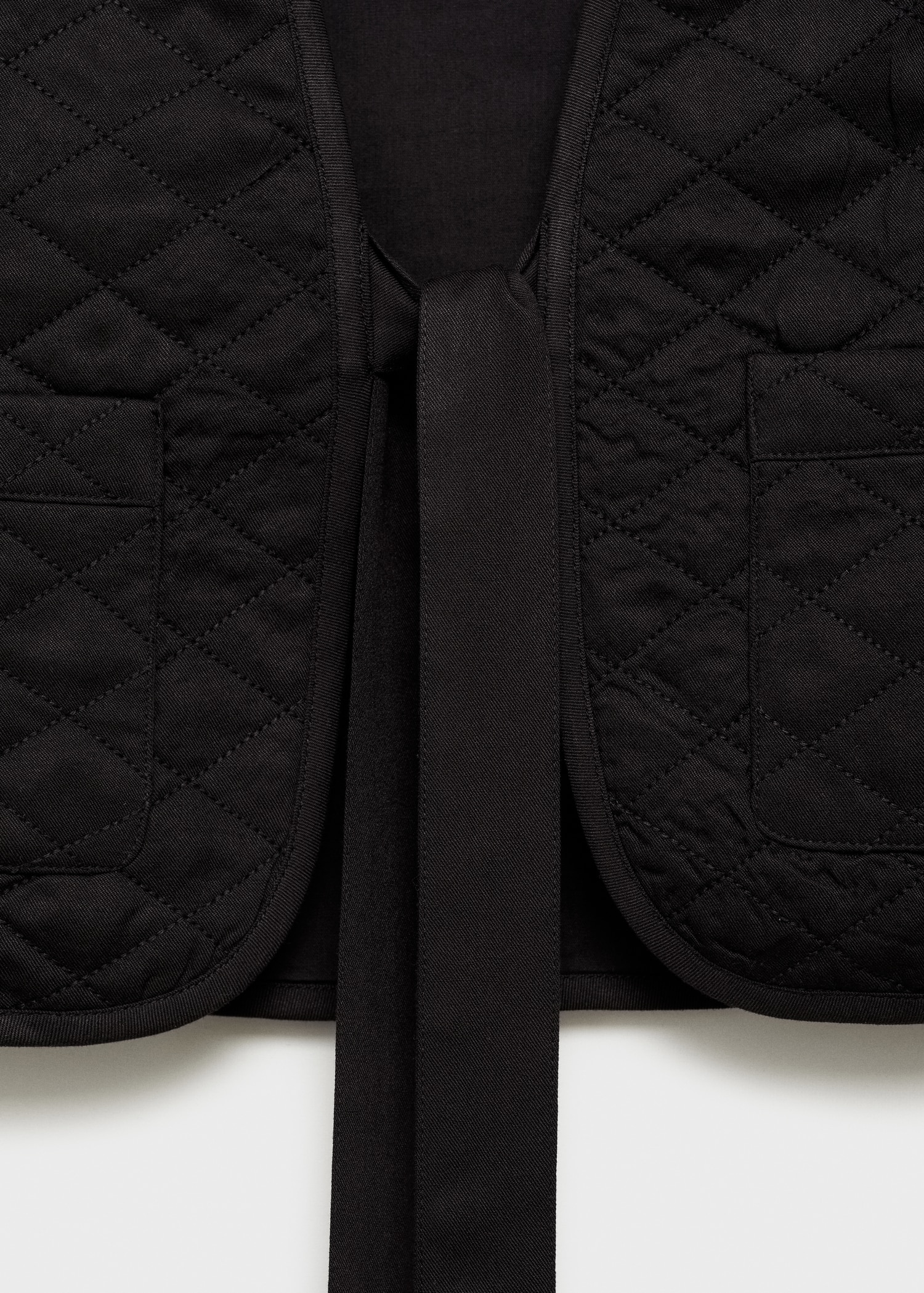 Quilted gilet with pleat - Details of the article 0