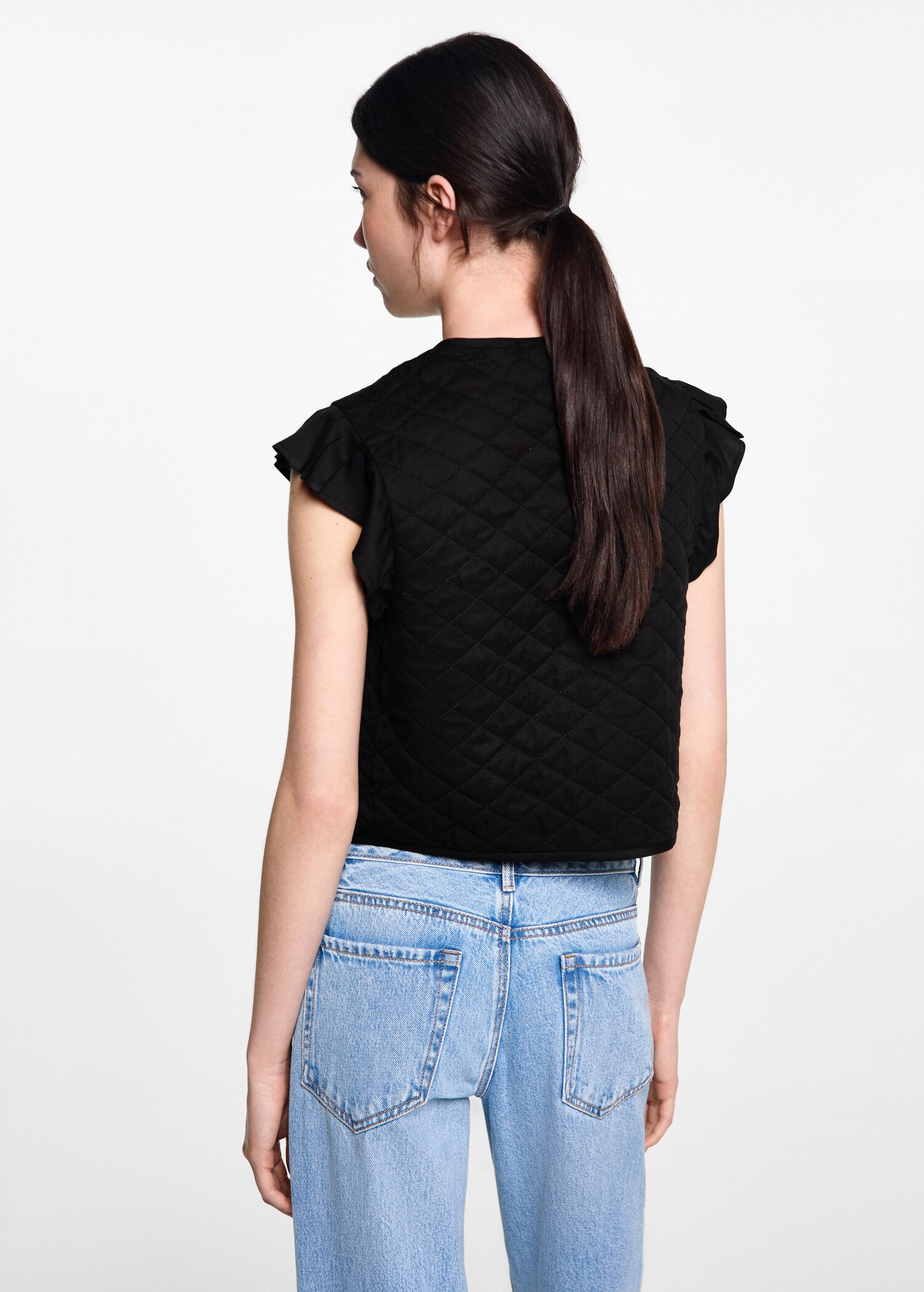 Quilted gilet with pleat - Reverse of the article
