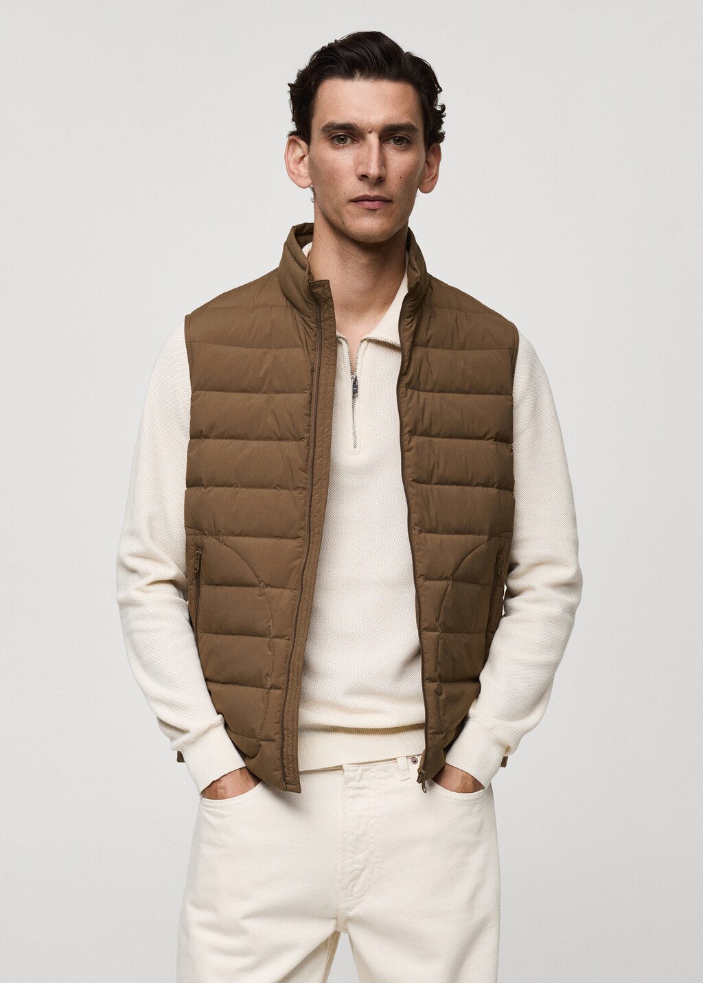 Quilted vest with feather filling