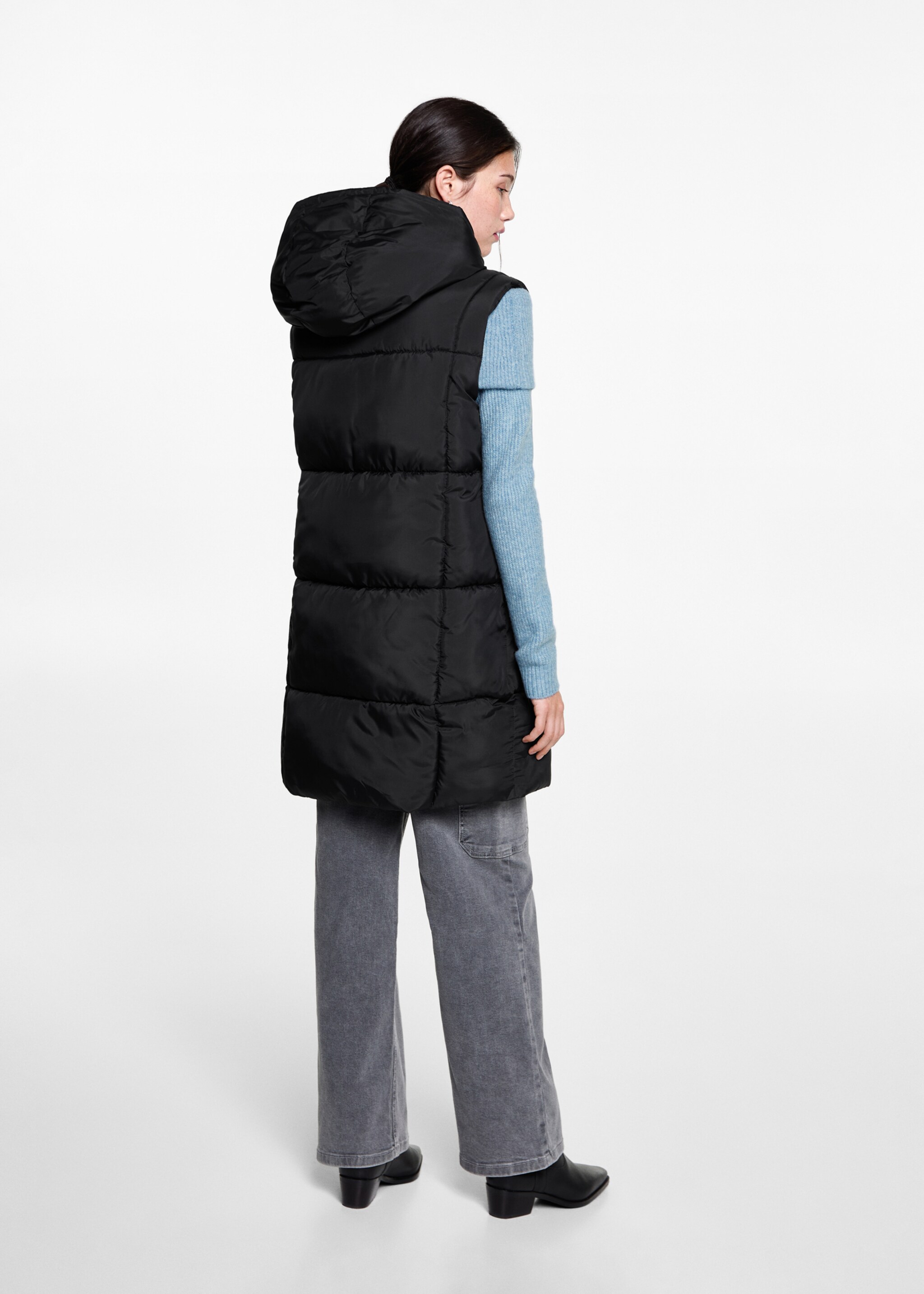 Quilted gilet with hood - Reverse of the article