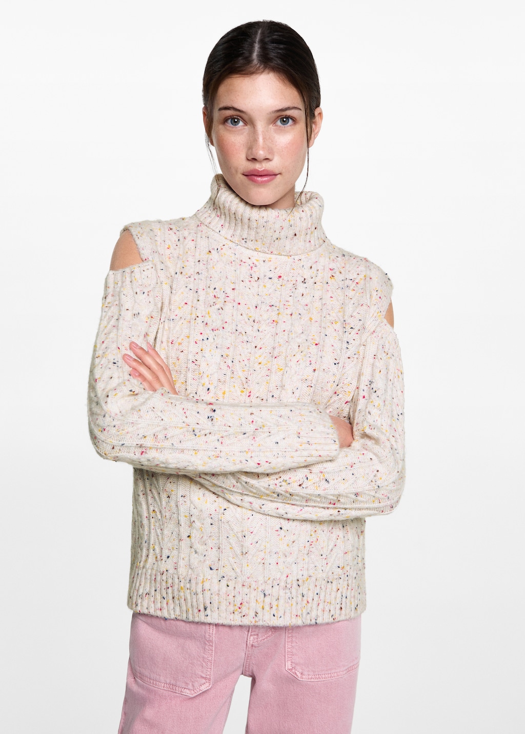 Knitted sweater with openings