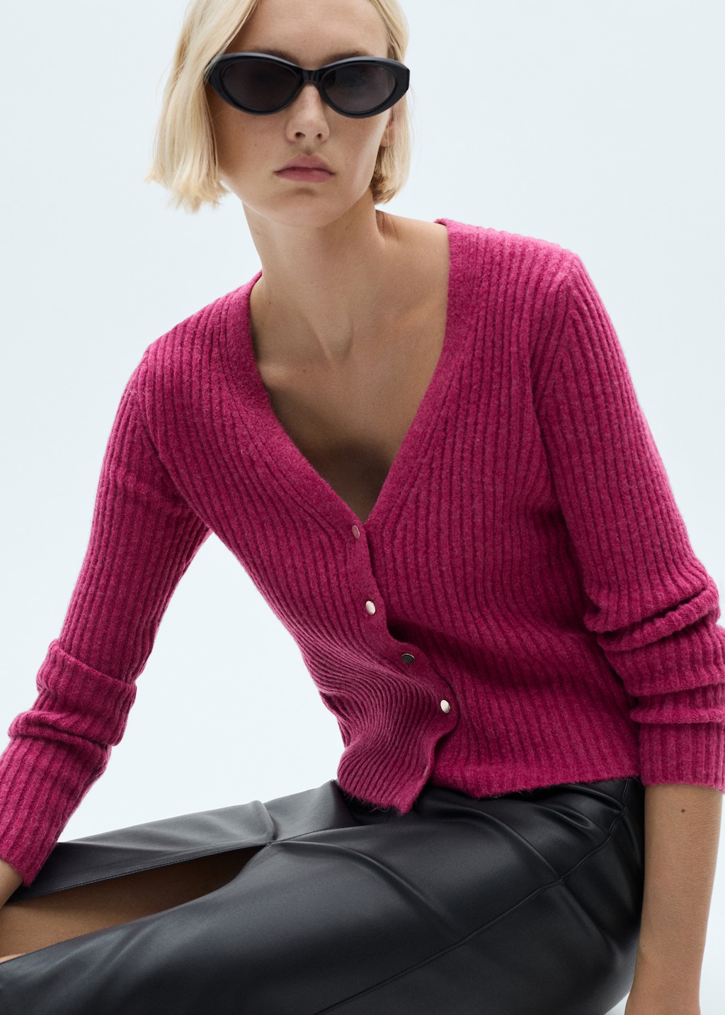 Knitted cardigan with metallic buttons