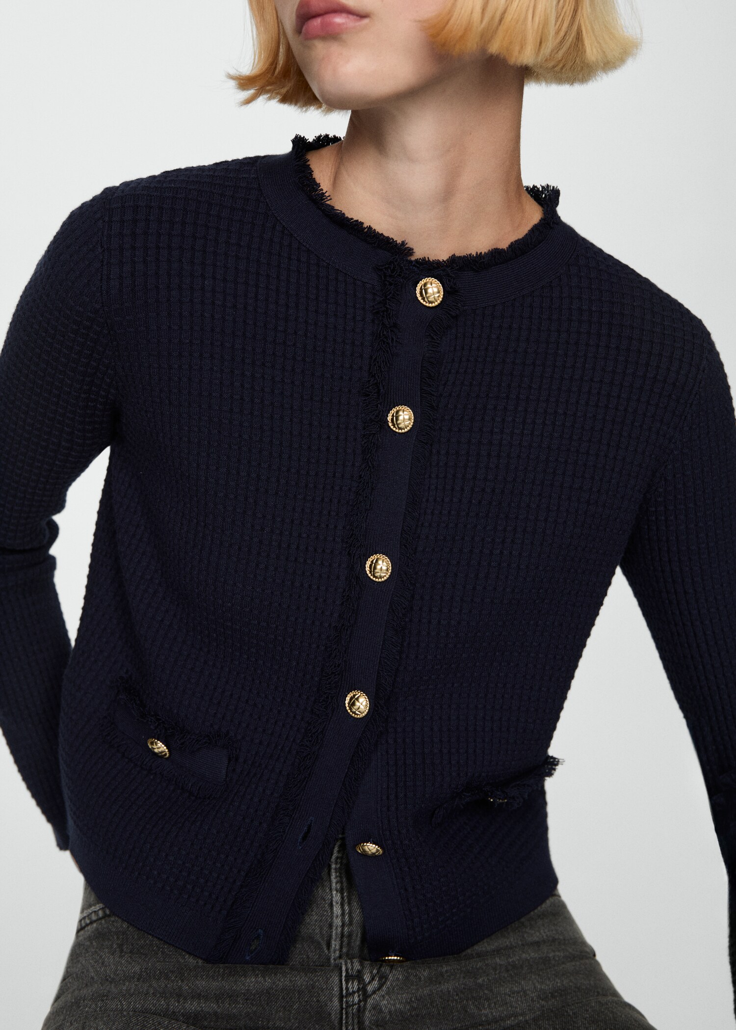 Gebreid vest met knopen - Detail van het artikel 6
