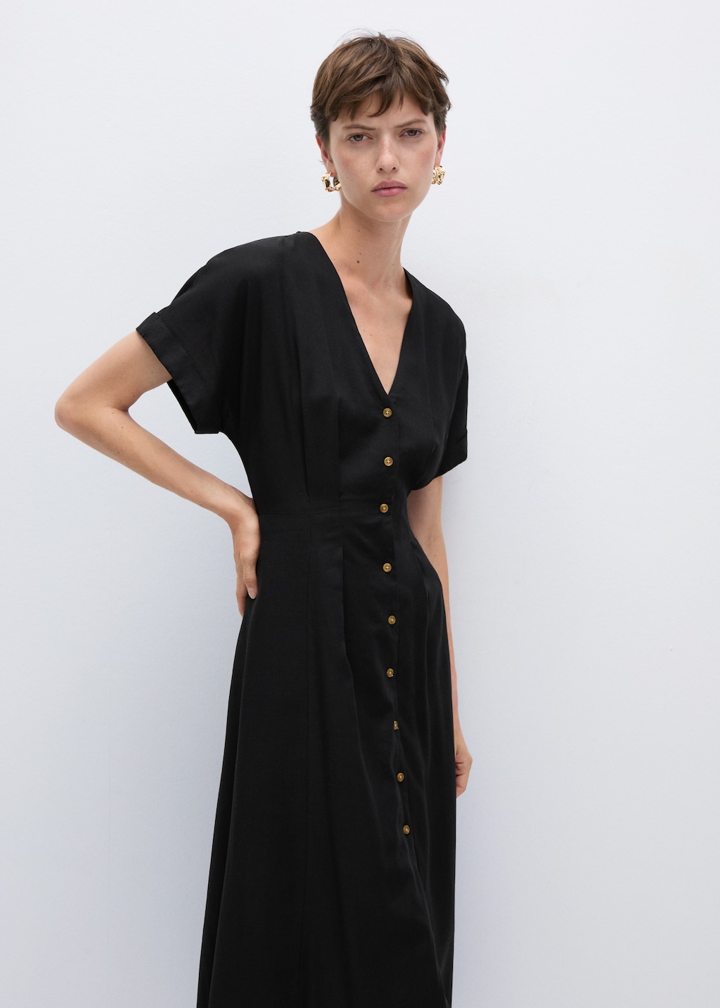 A line dress with buttons Women MANGO Georgia