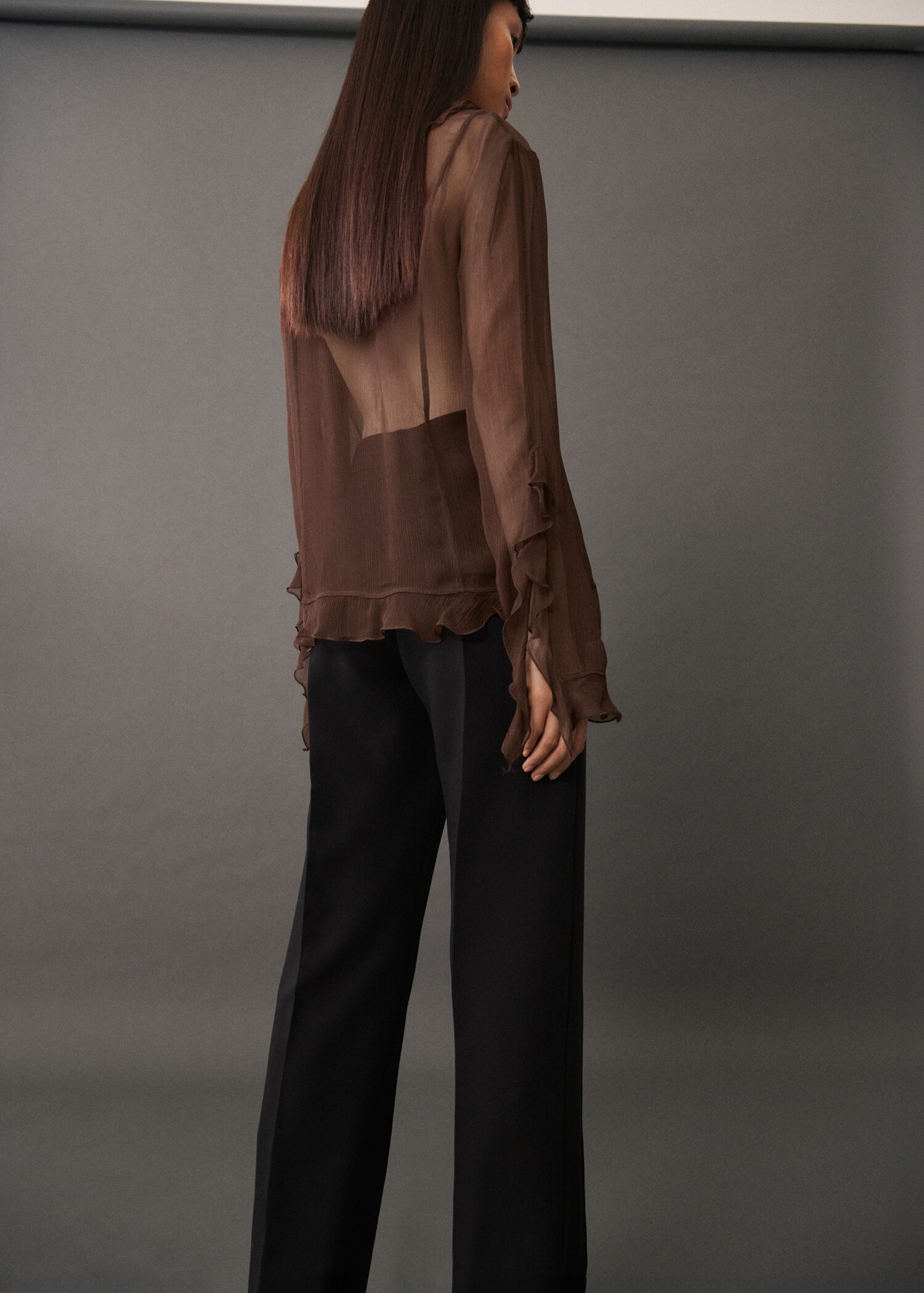 Semi-transparent ruffled blouse - Reverse of the article