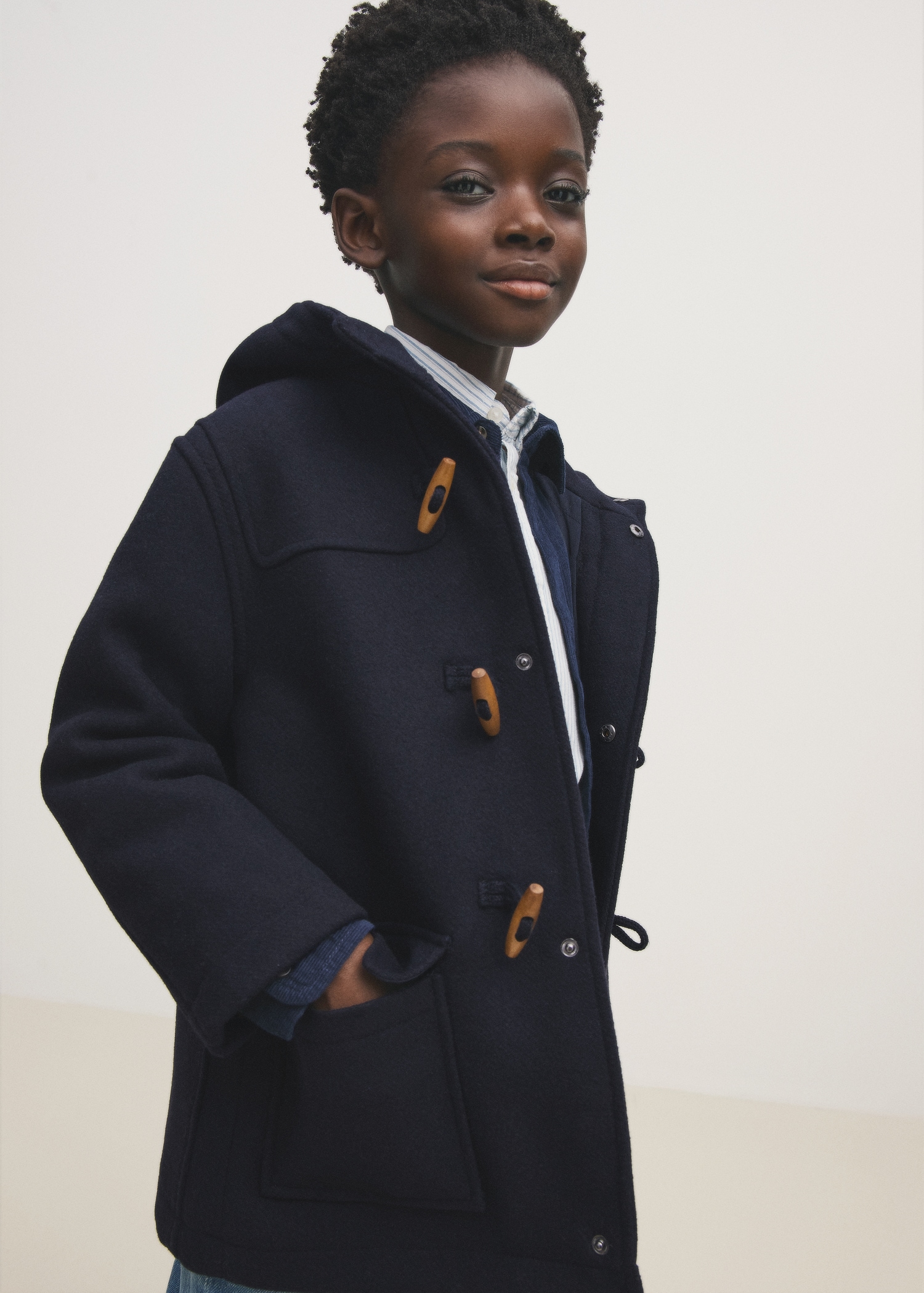 Abrigo paño bolsillos