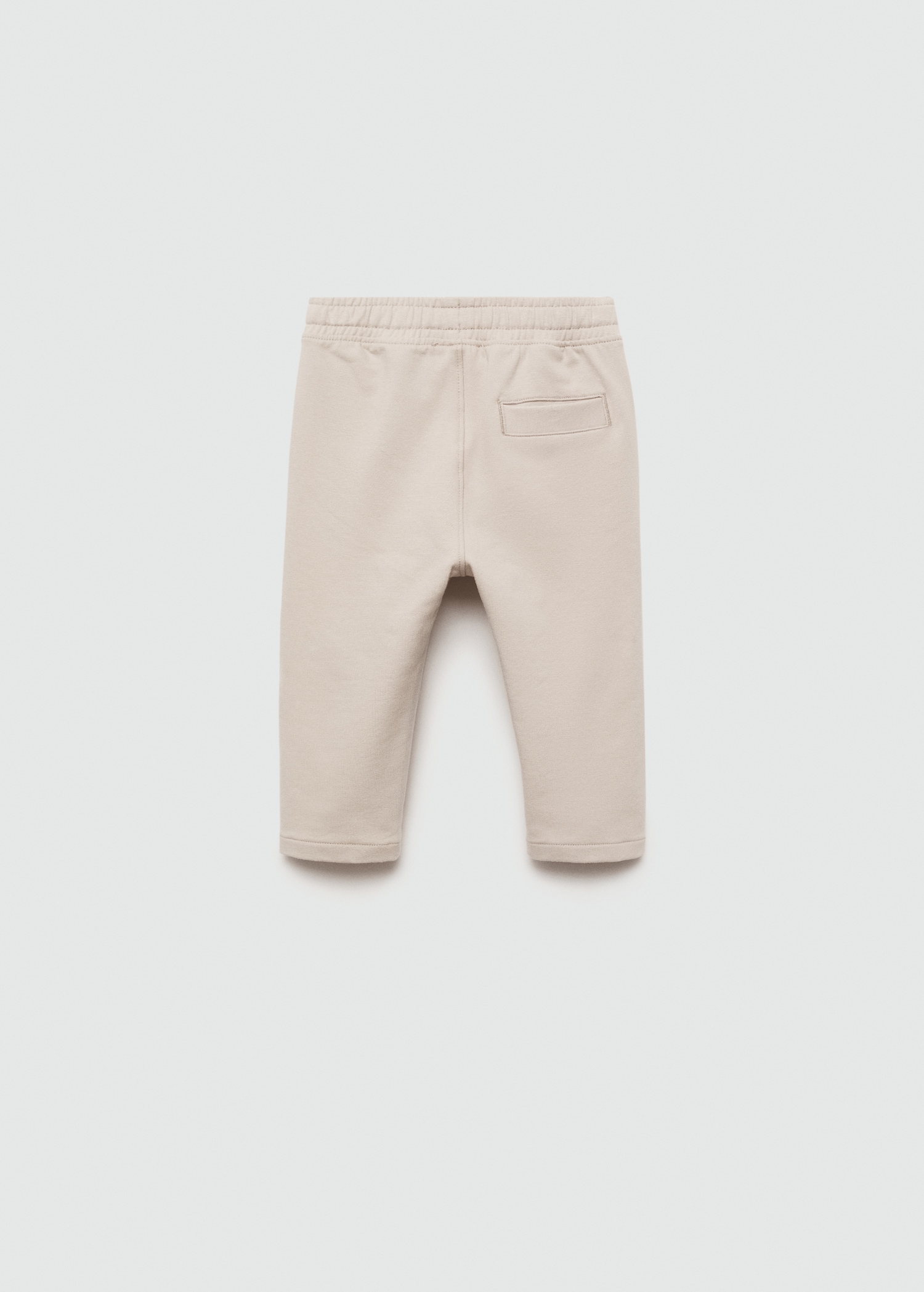 Elastic waist trousers - Reverse of the article