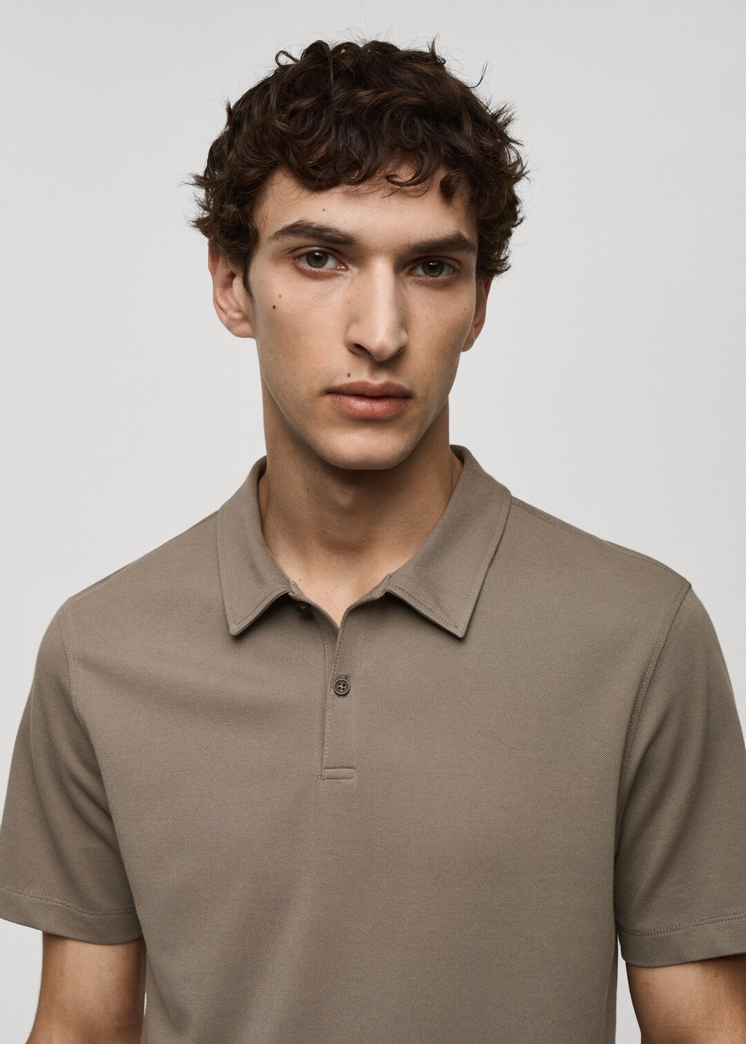 Slim-fit cotton piqué textured polo shirt - Men | MANGO USA