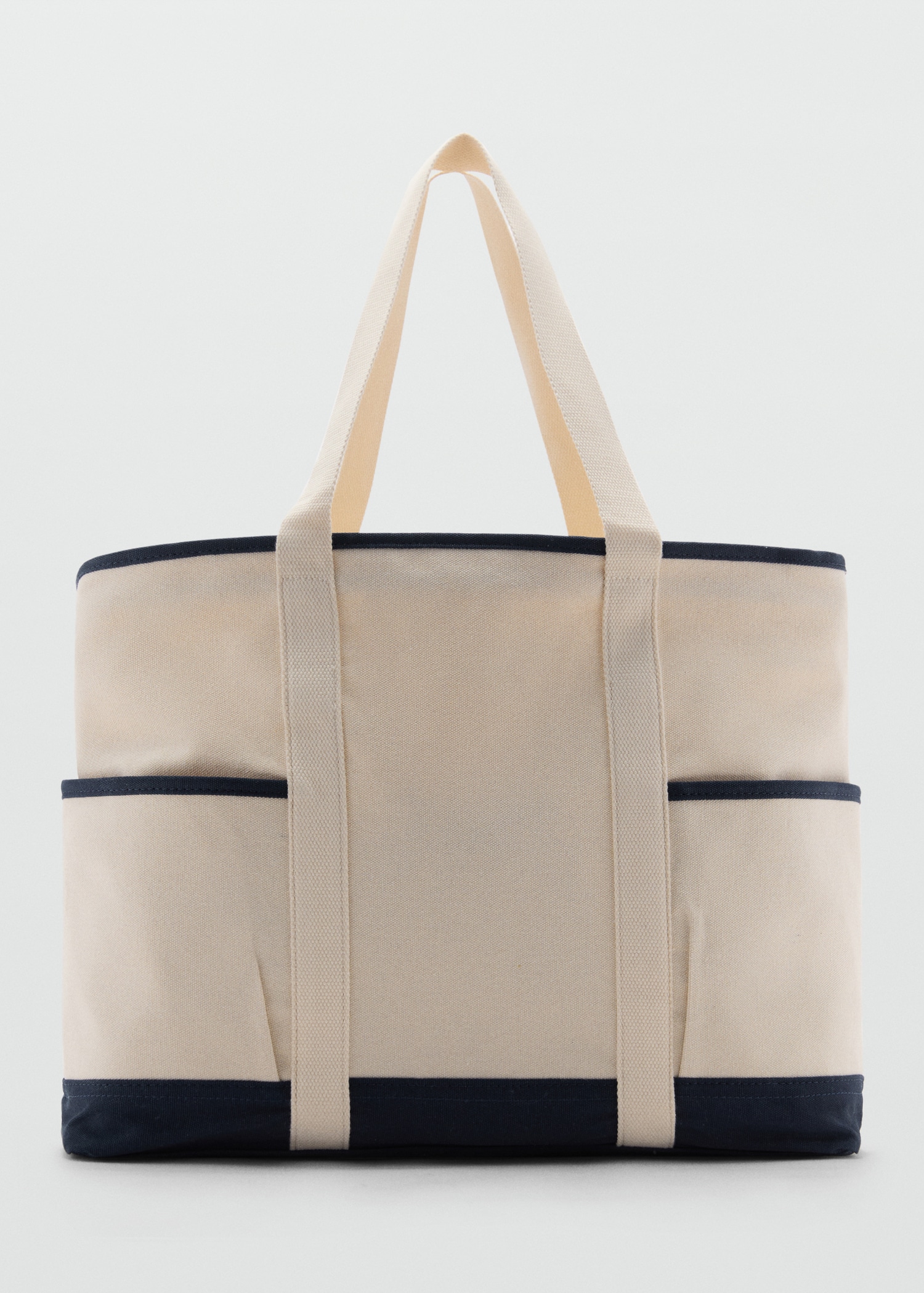 Contrasting cotton canvas bag Men MANGO Pakistan