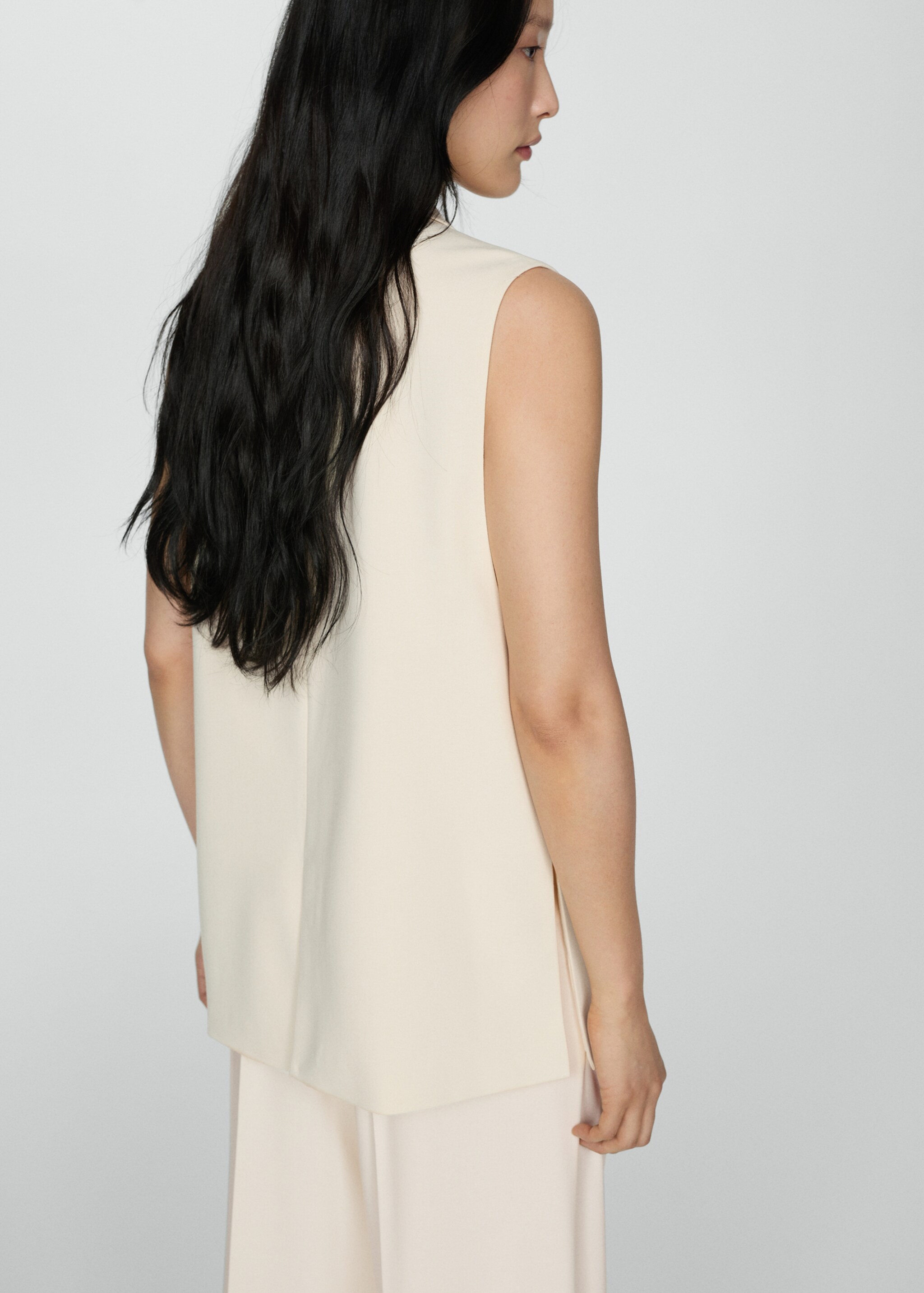 Long gilet with openings - Reverse of the article