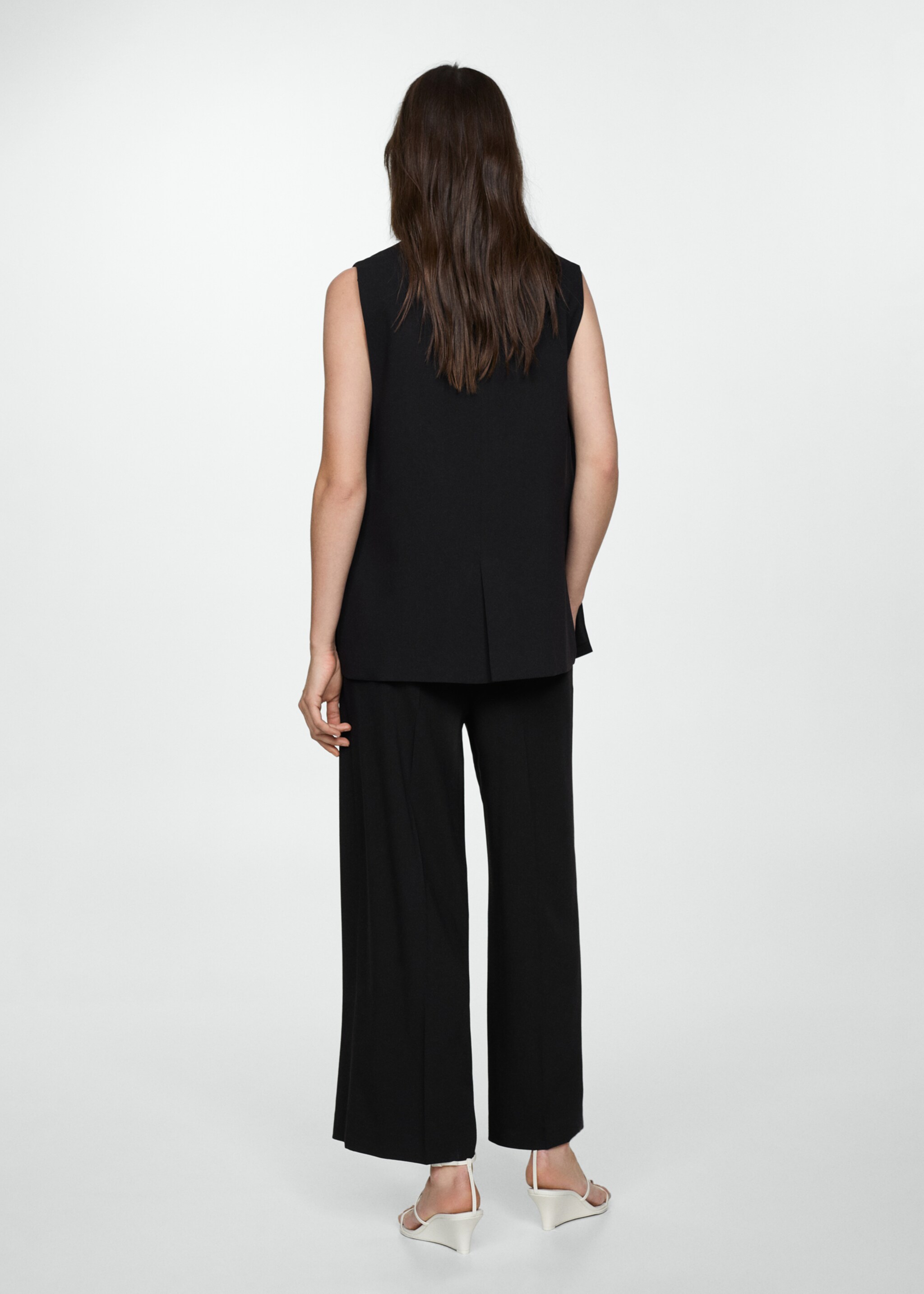 Long gilet with openings - Reverse of the article