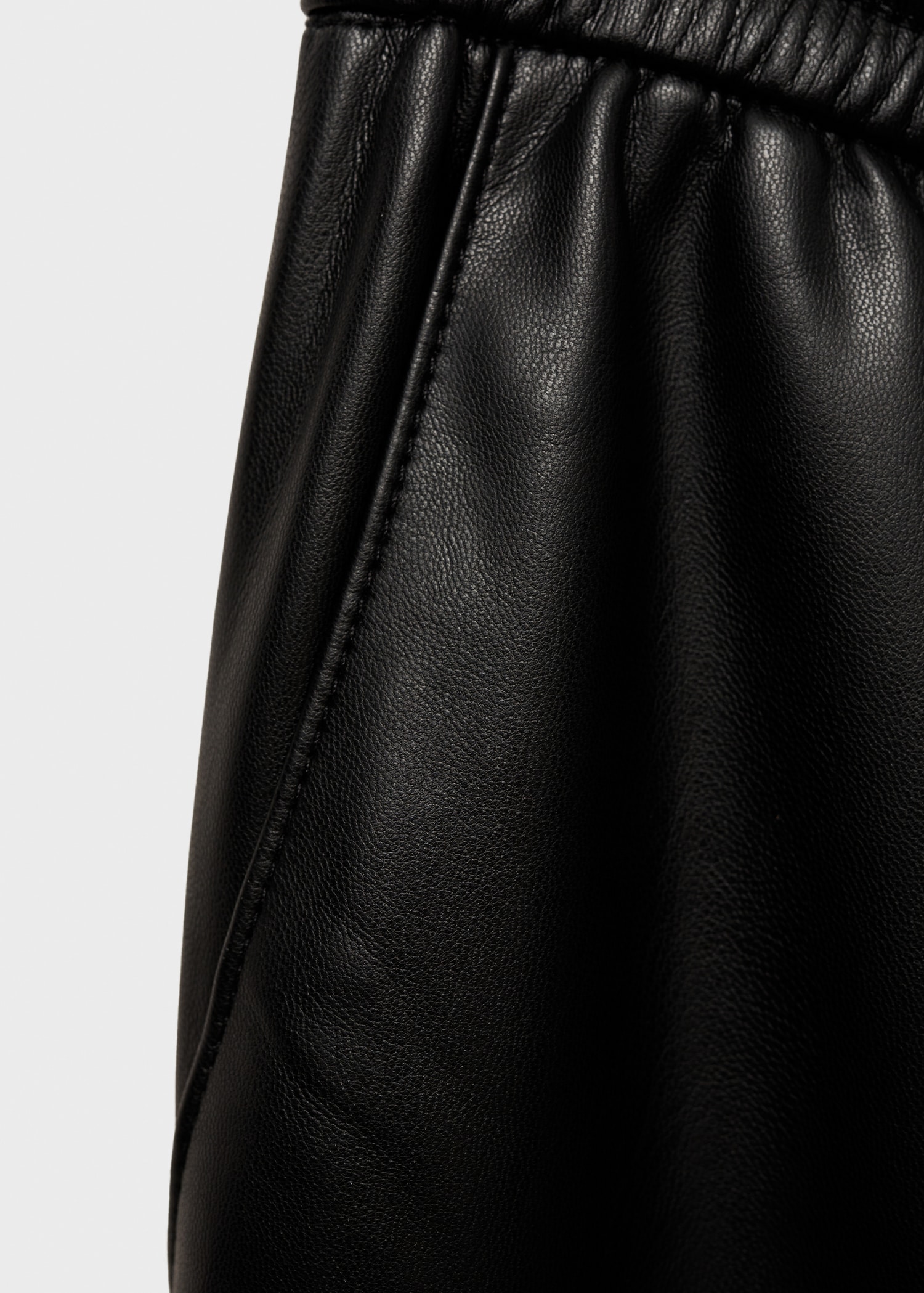 Leather-effect elastic waist trousers - Details of the article 0