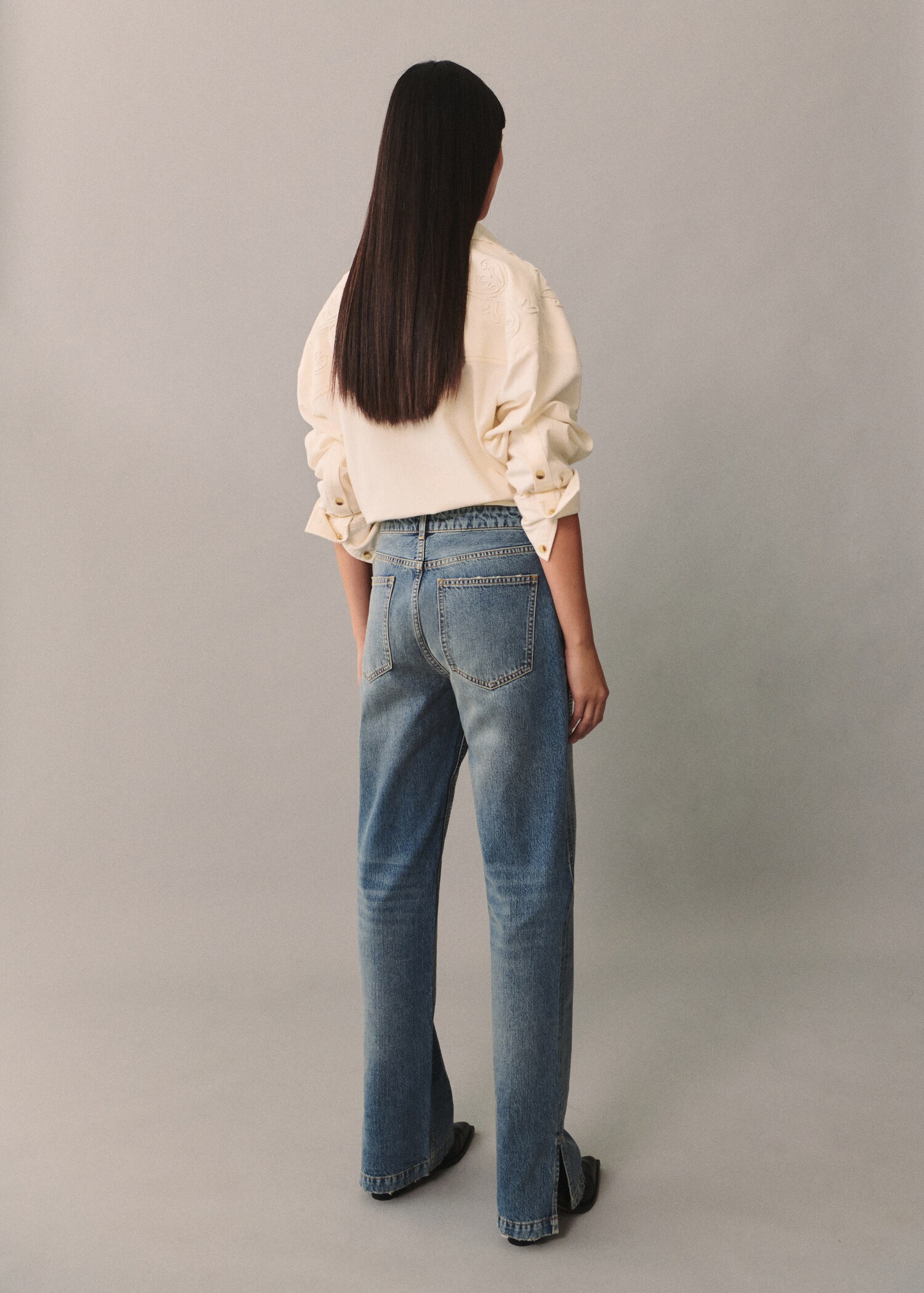 Jeans with sequins under slits - Reverse of the article