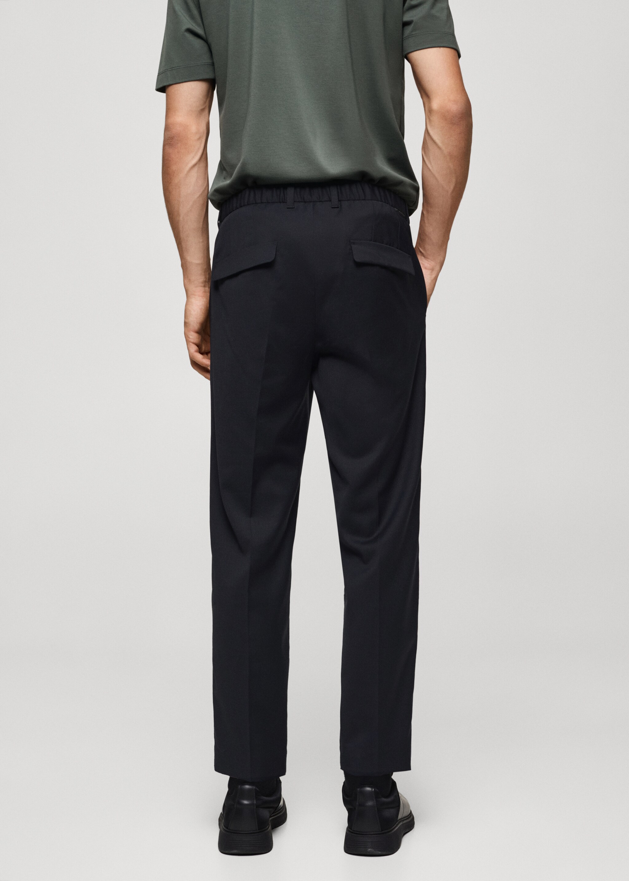 Coolmax® stretch fabric slim-fit trousers - Reverse of the article