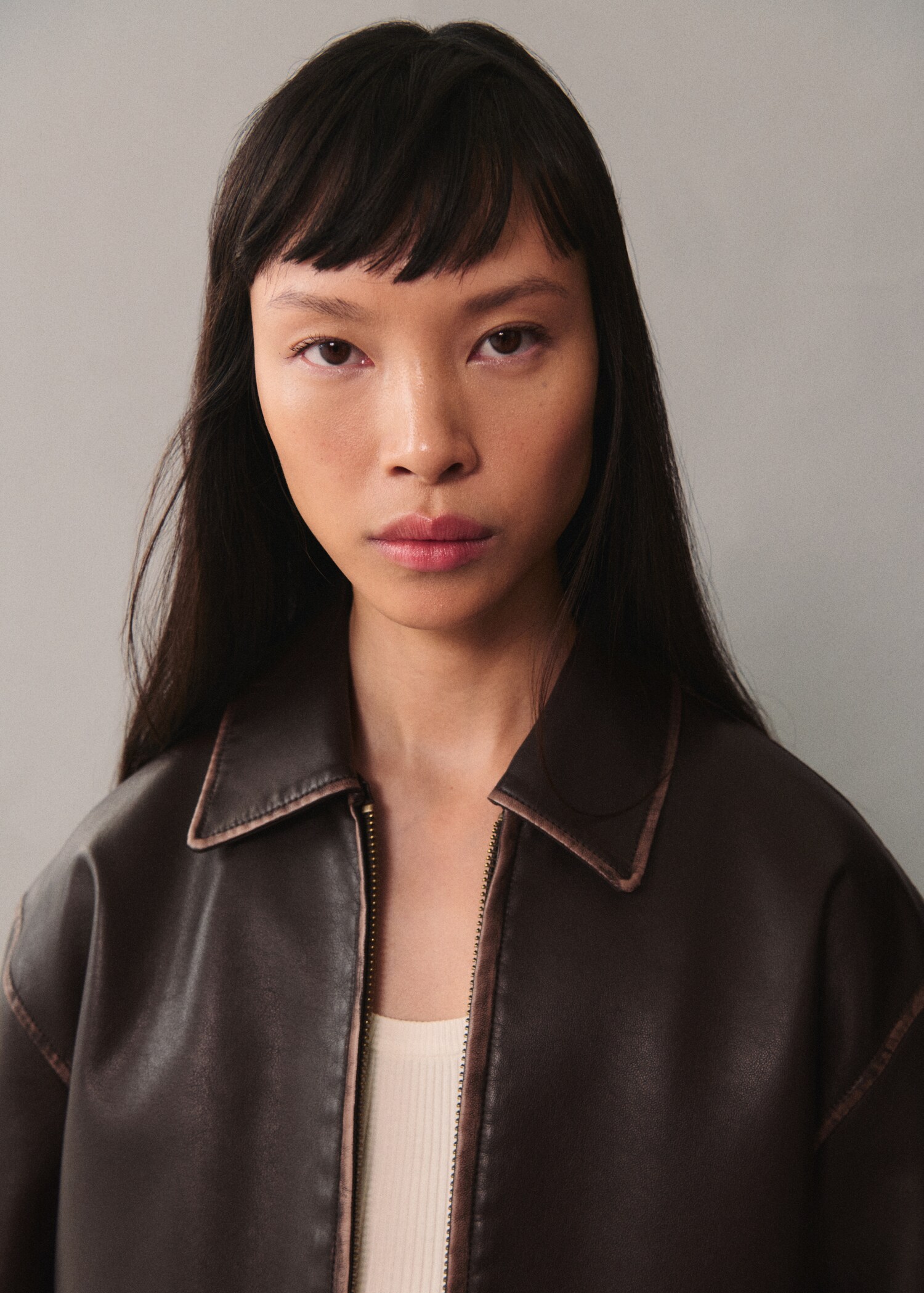 Leather-effect jacket with contrast stitching - Details of the article 1