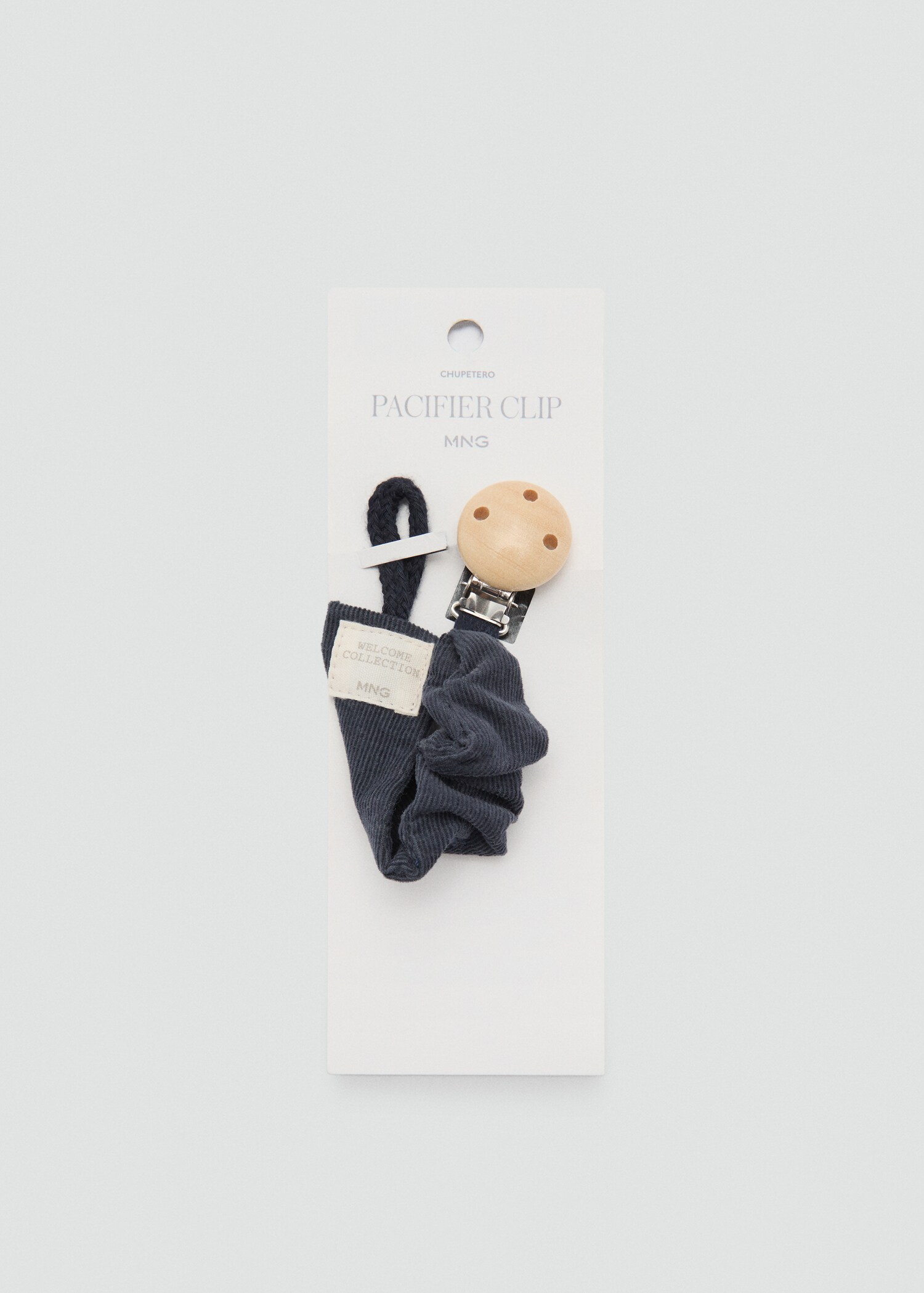 Attache-tétine broche velours côtelé - Plan moyen