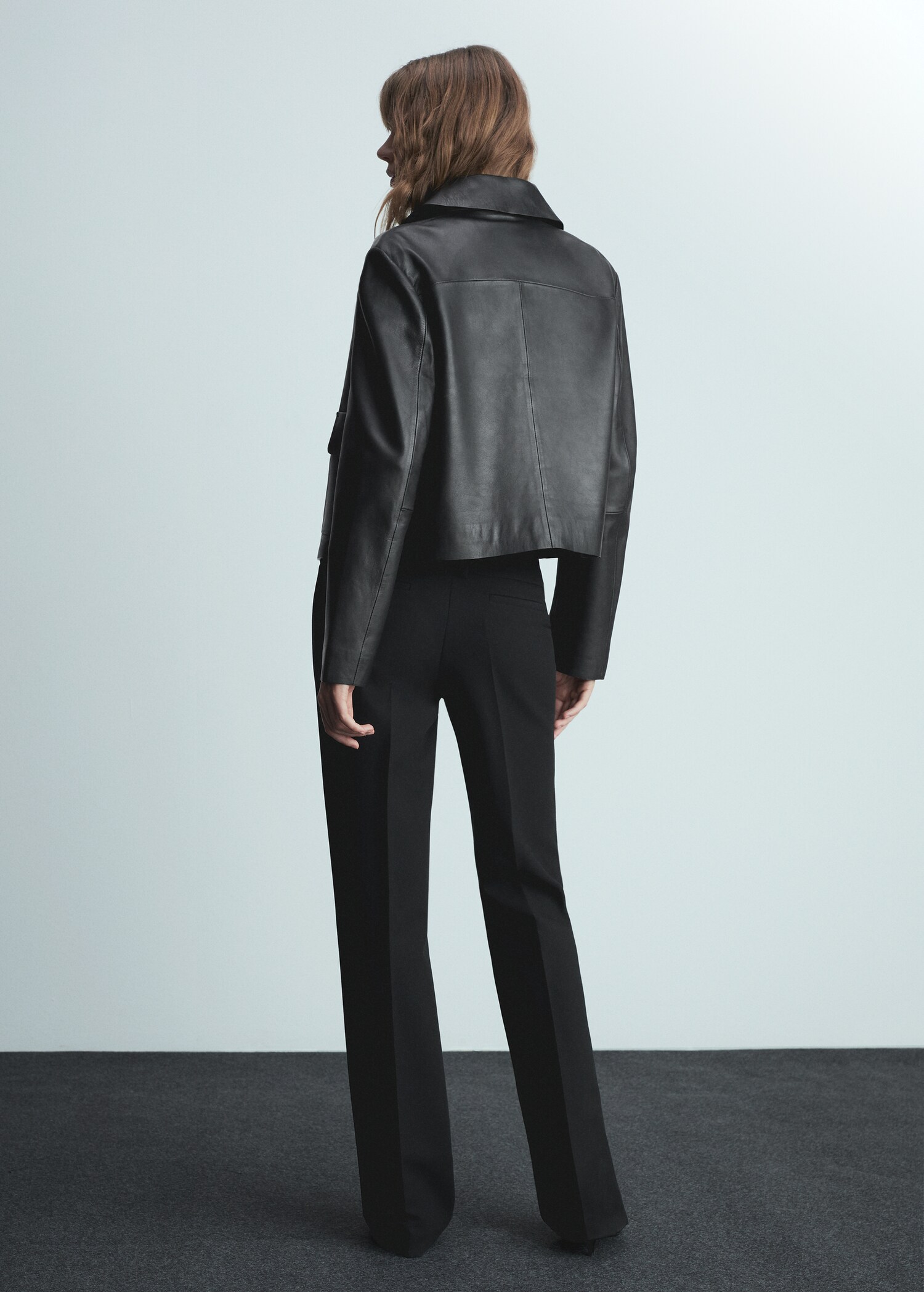 Low-rise flared trousers - Reverse of the article