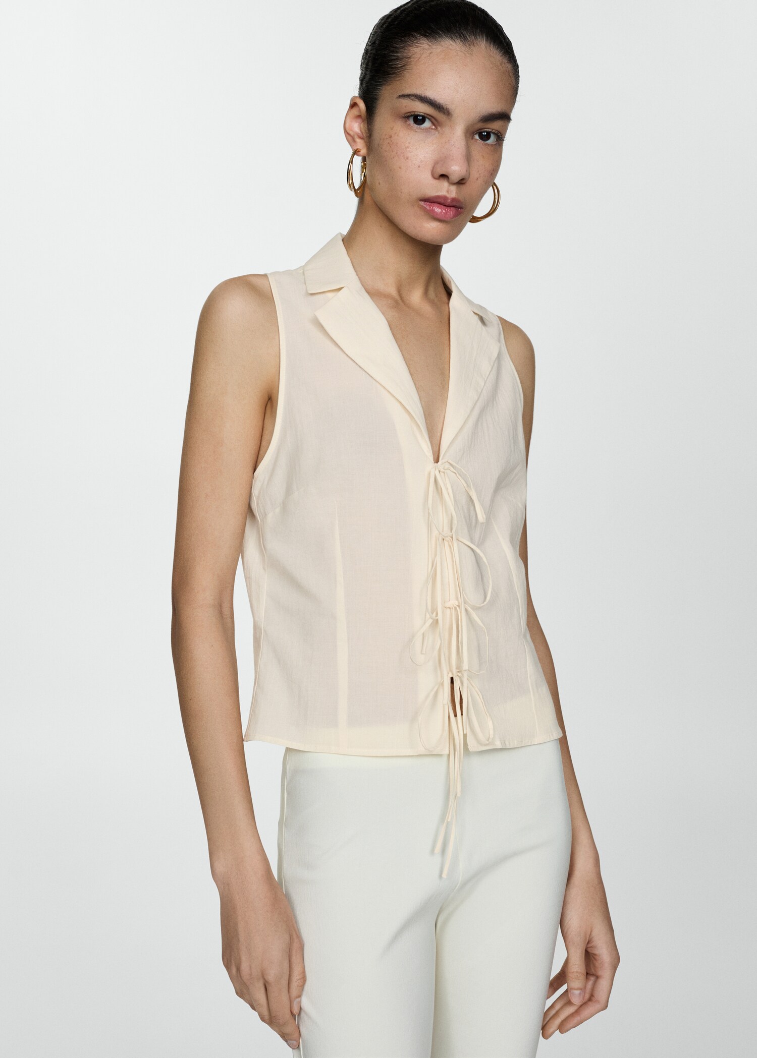 Sleeveless blouse with bows - Medium plane